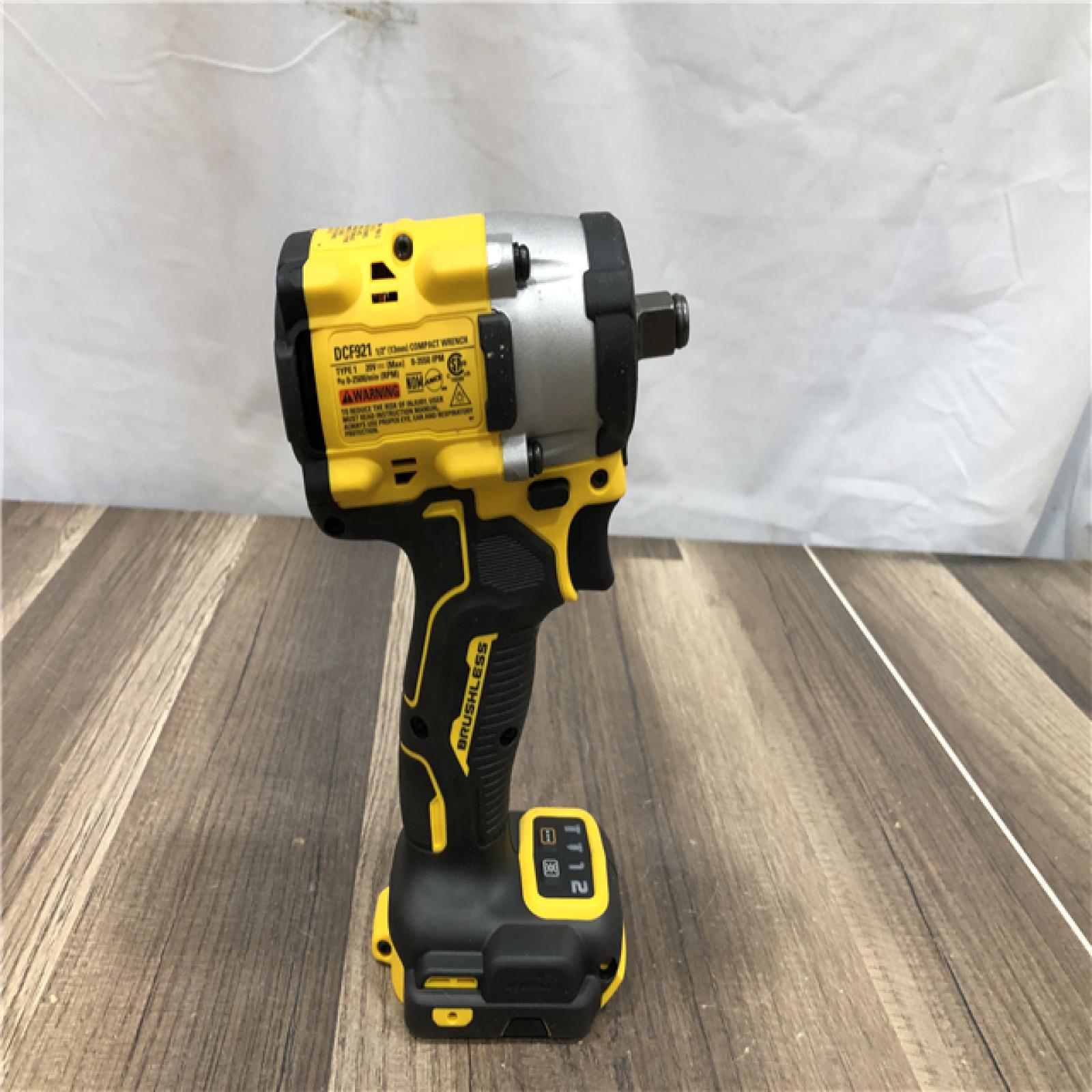 AS-IS DEWALT ATOMIC 20V MAX Cordless Brushless 1/2 in. Variable Speed Impact Wrench (Tool Only)