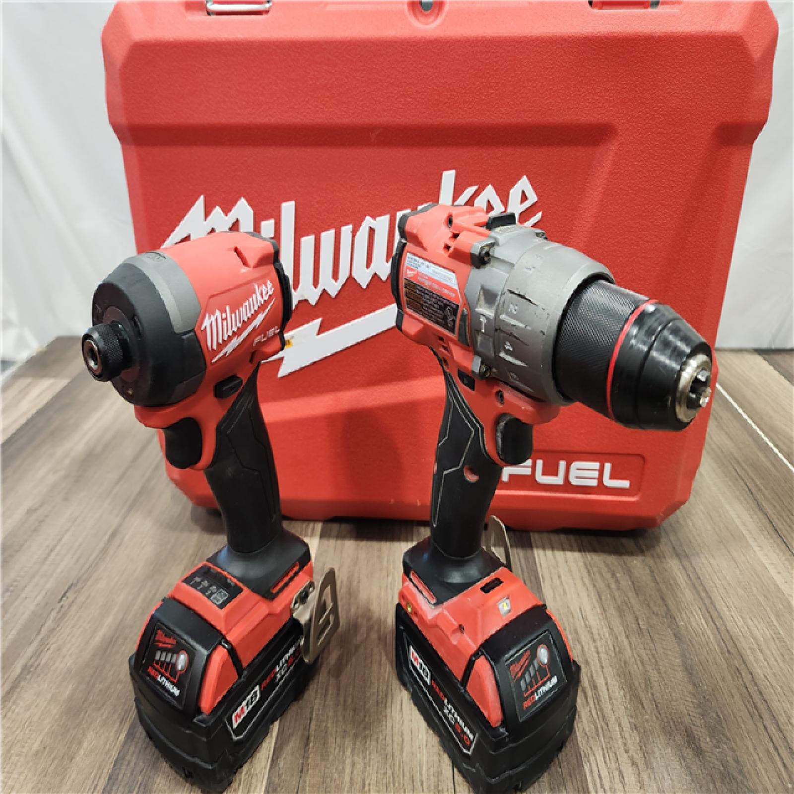 AS-IS  MILWAUKEE FUEL 18V Lithium-Ion Brushless Cordless Hammer Drill and Impact Driver Combo Kit (2-Tool) with 2 Batteries