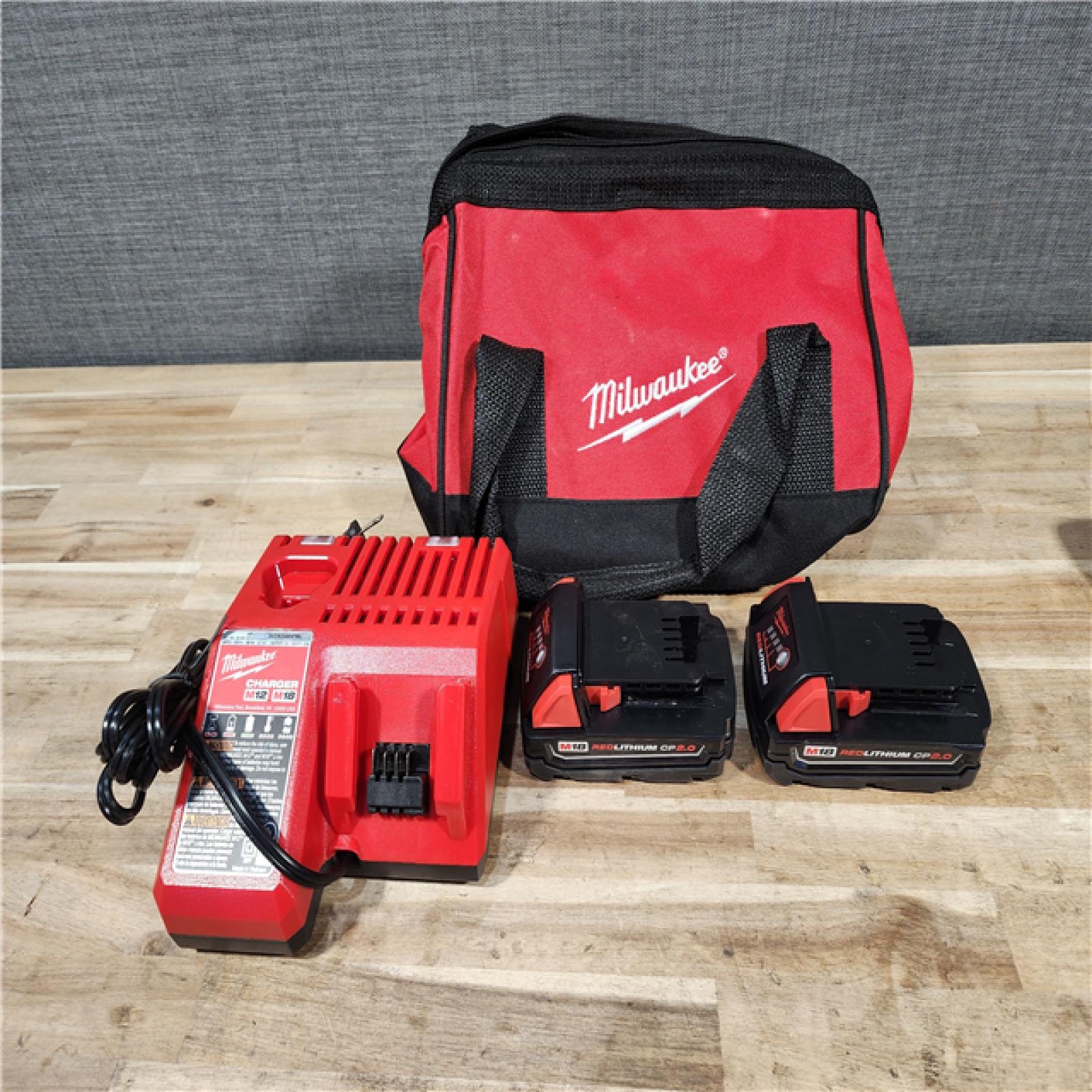 HOUSTON LOCATION - AS-IS Milwaukee 18V Lithium-Ion Cordless Drill Driver/Impact Driver Combo Kit