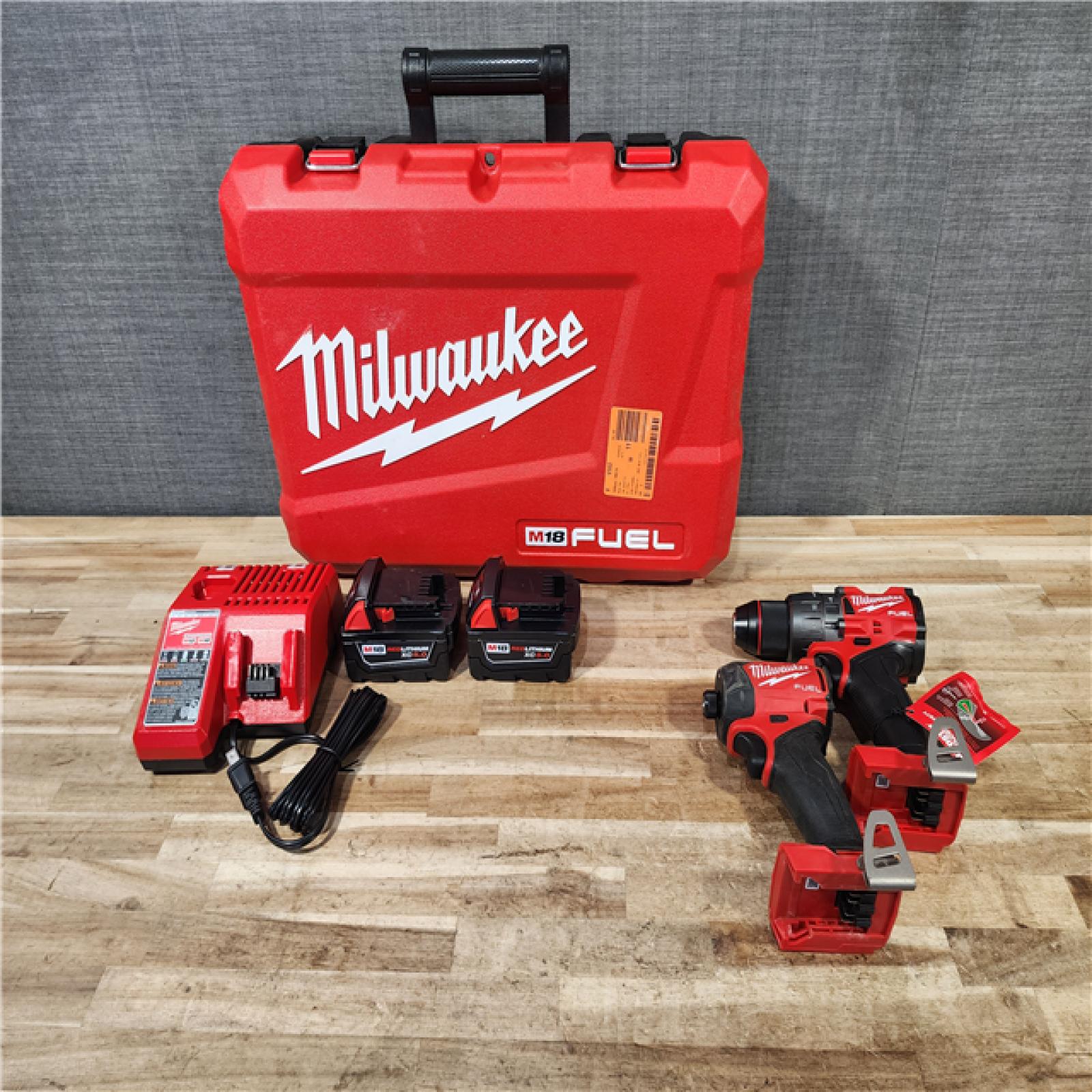 HOUSTON LOCATION - AS-IS Milwaukee 2 Tool Combo Kit W/ (2) Battery & Charger