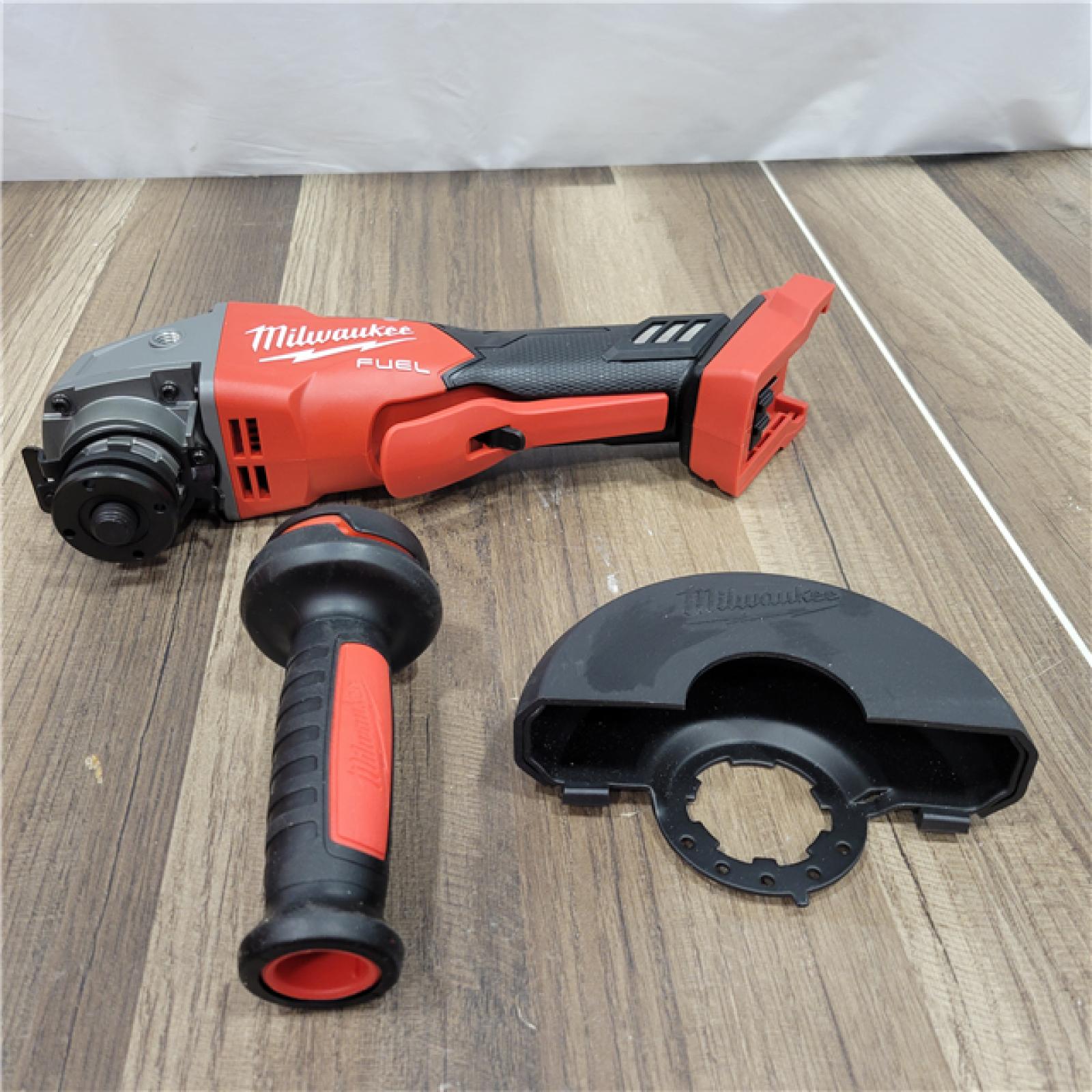 AS-IS Milwaukee 2880-20 M18 FUEL 18-Volt Lithium-Ion Brushless Cordless 4-1/2 in./5 in. Grinder W/Paddle Switch (Tool-Only)