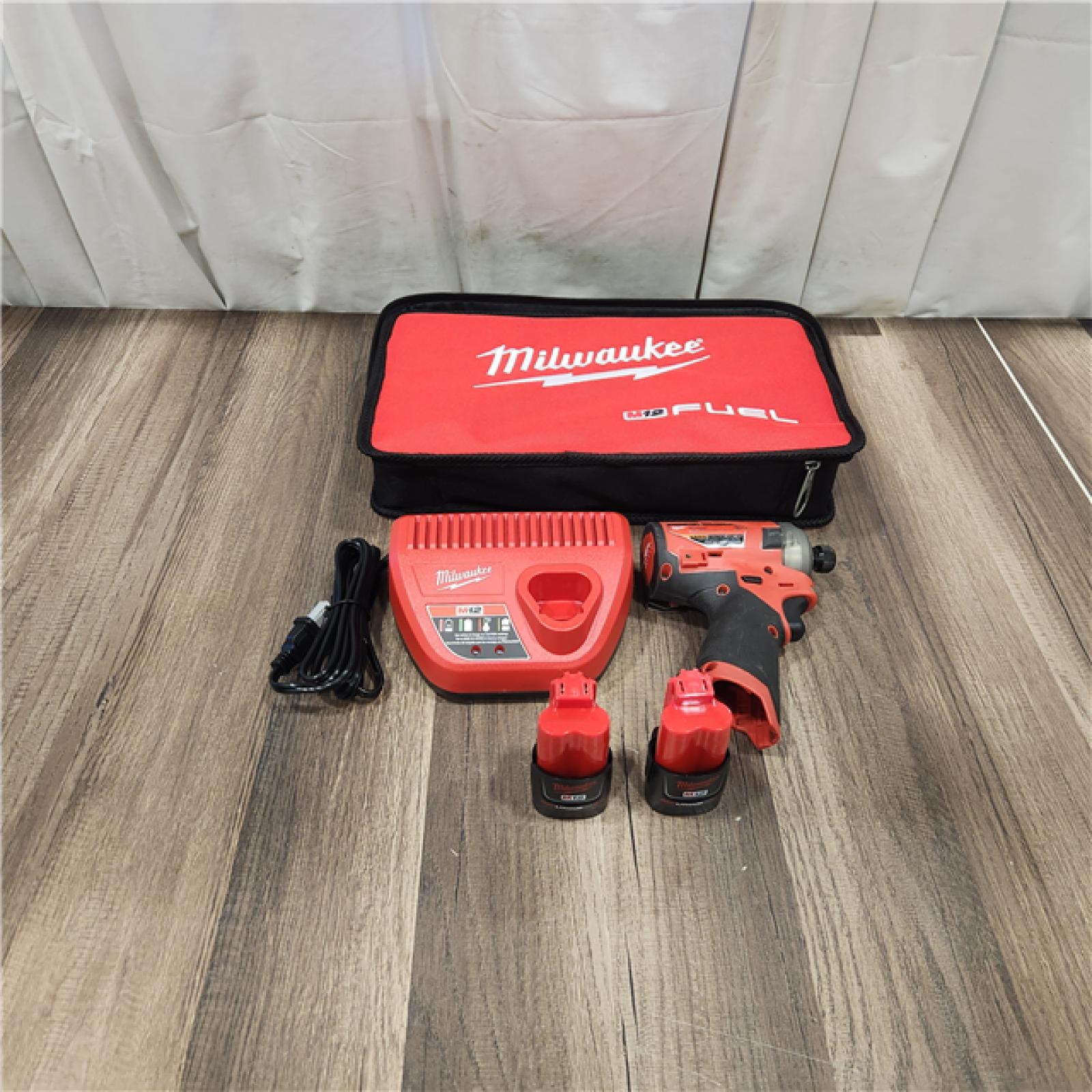 M12 FUEL SURGE 12-Volt Lithium-Ion Brushless Cordless 1/4 in. Hex Impact Driver Compact Kit w/Two 2.0Ah Batteries, Bag M12 FUEL SURGE 12-Volt Lithium-Ion Brushless Cordless 1/4 in. Hex Impact Driver Compact Kit w/Two 2.0Ah Batteries, Bag