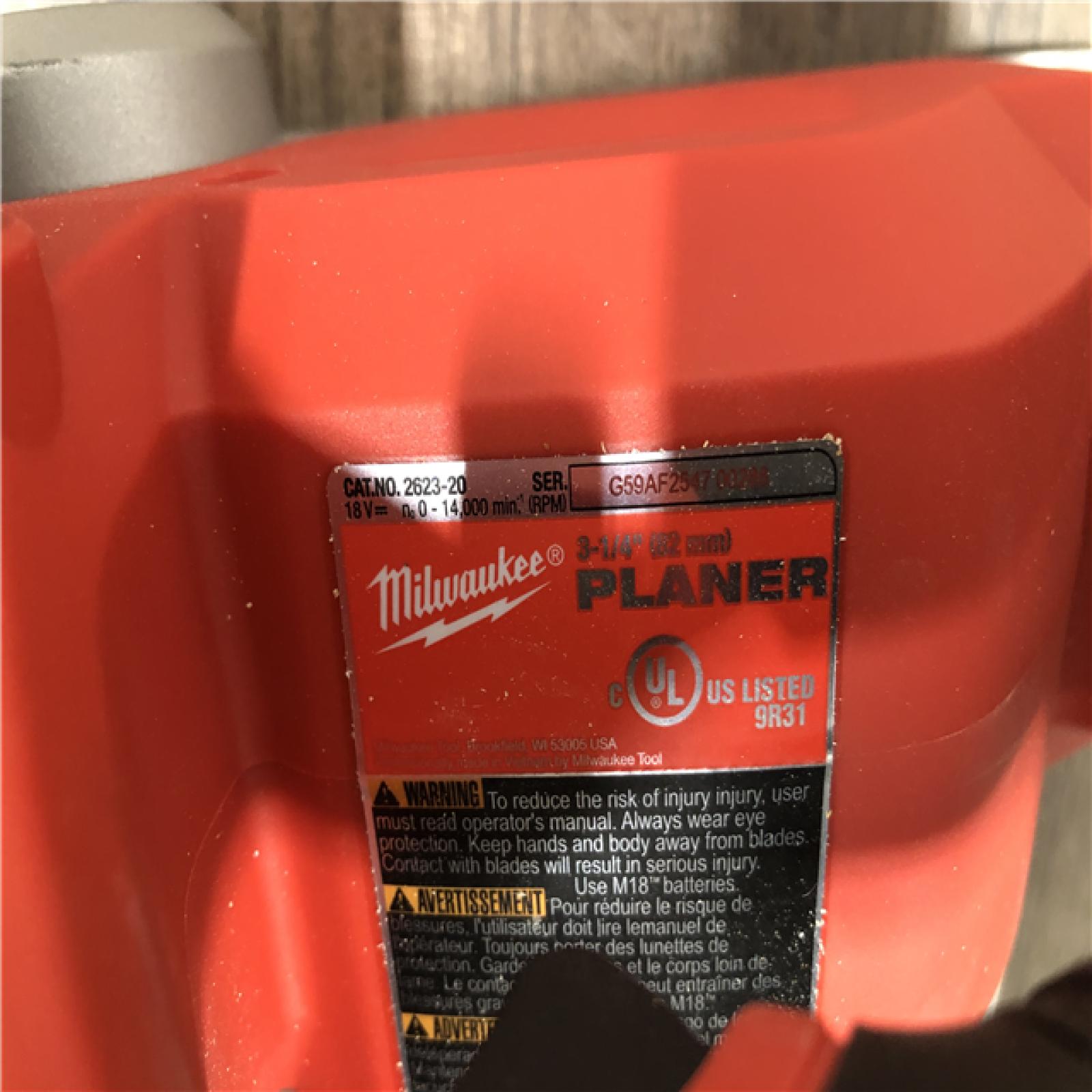 AS-IS Milwaukee M18 18V Lithium-Ion Cordless 3-1/4 in. Planer (Tool-Only)