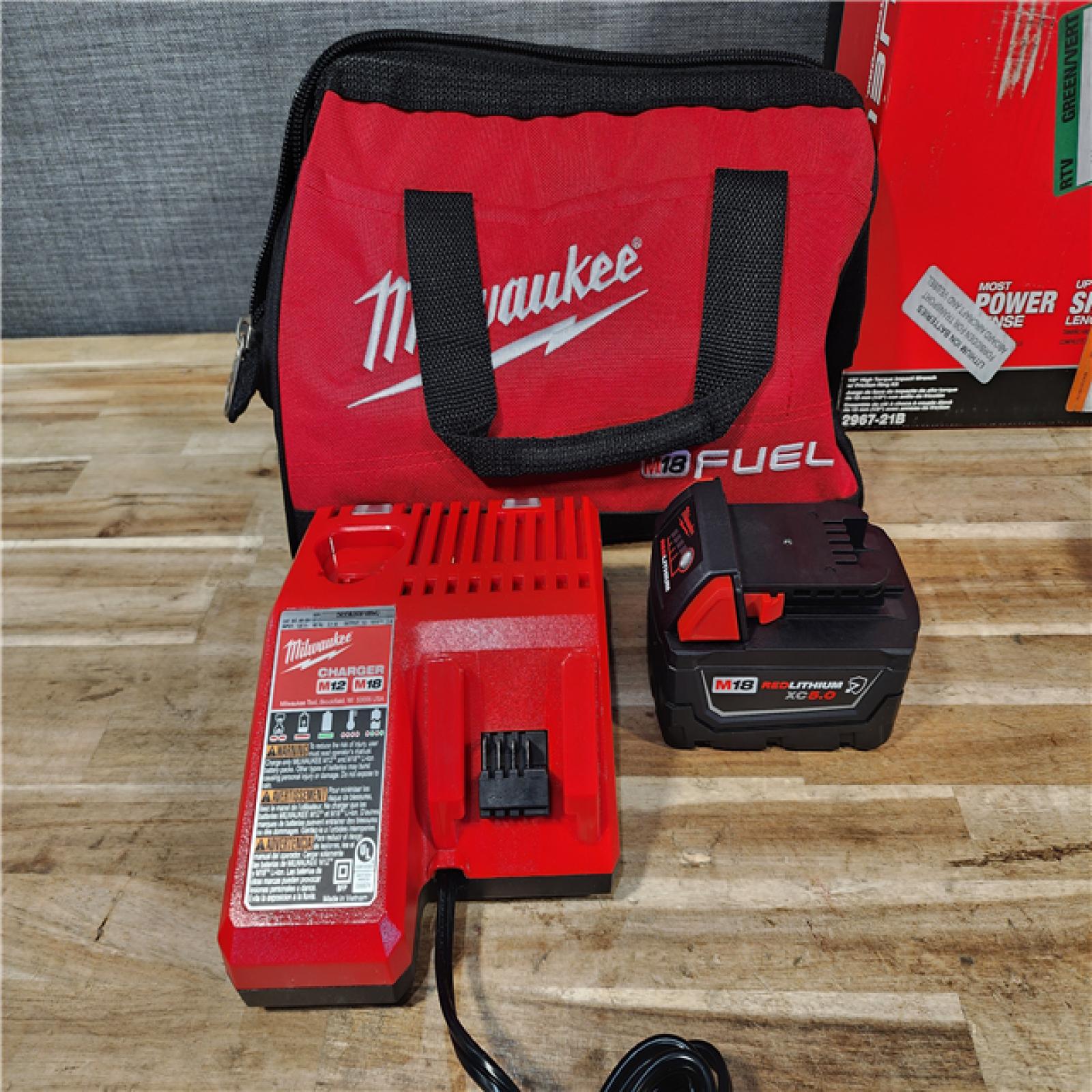 HOUSTON LOCATION - AS-IS (APPEARS LIKE NEW) Milwaukee FUEL 18V Lithium-Ion Brushless Cordless 1/2 in. Impact Wrench w/Friction Ring Kit
