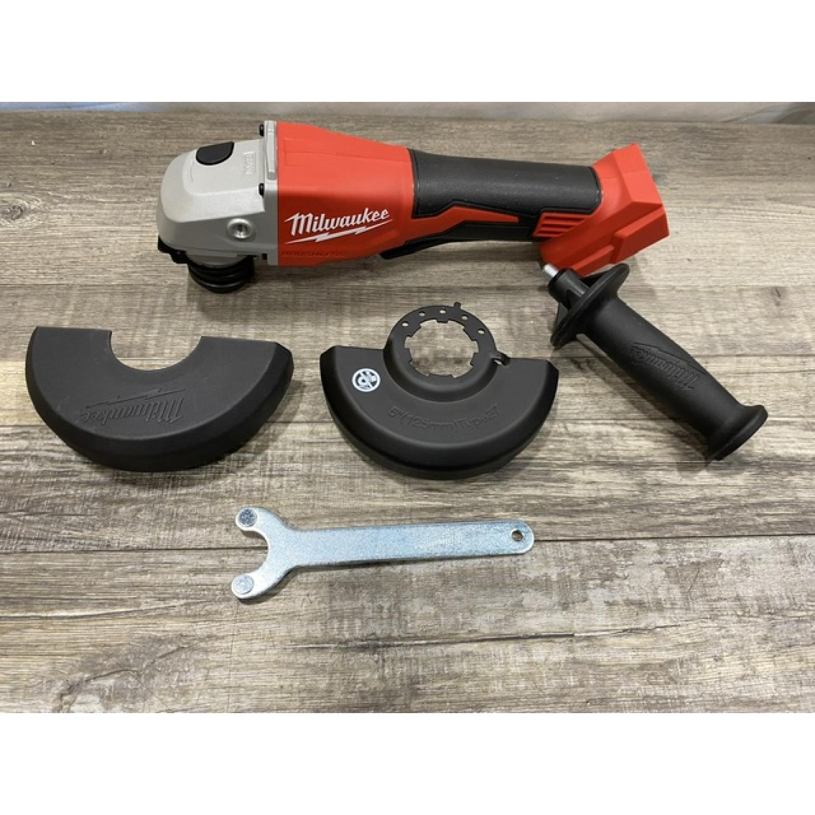 AS-IS Milwaukee 18V Lithium-Ion Brushless Cordless 4-1/2 in./5 in. Grinder w/Paddle Switch (Tool-Only)
