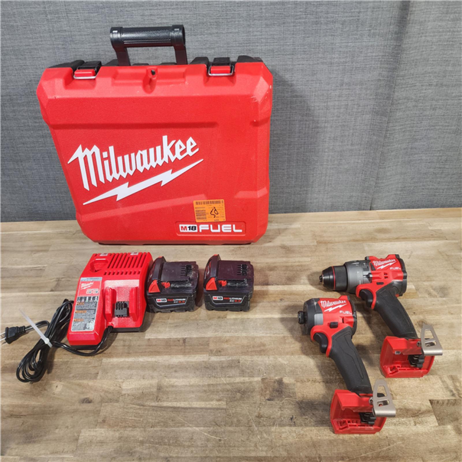 HOUSTON LOCATION - AS-IS MILWAUKEE FUEL 18V Lithium-Ion Brushless Cordless Hammer Drill and Impact Driver Combo Kit (2-Tool) with 2 Batteries