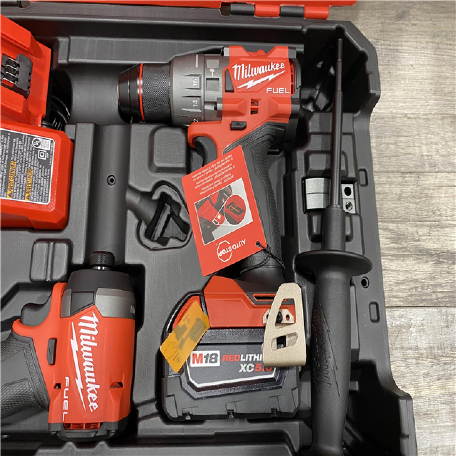 AS-IS Milwaukee FUEL 18V Lithium-Ion Brushless Cordless Hammer Drill and Impact Driver Combo Kit