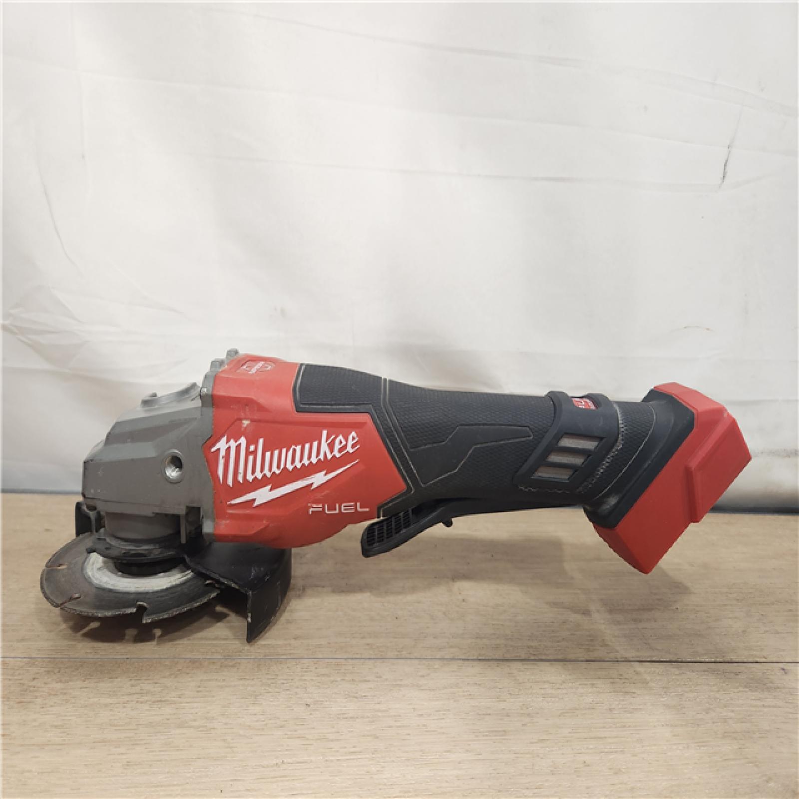 AS-IS- Milwaukee  FUEL 18-Volt Lithium-Ion Brushless Cordless 4-1/2 in./6 in. Braking Grinder with Paddle Switch (Tool-Only)