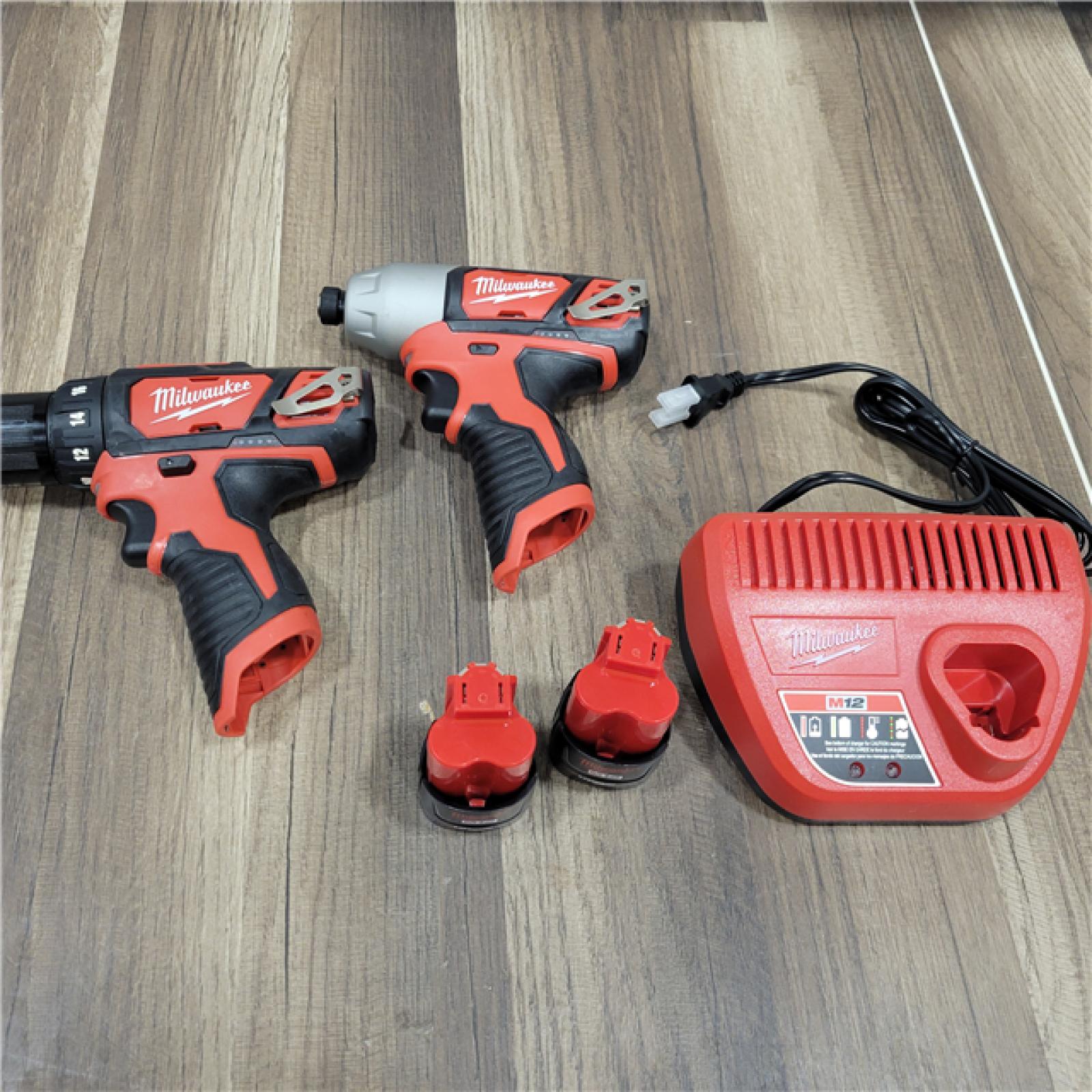 AS-IS Milwaukee M12 FUEL SURGE 12V Lithium-Ion Brushless Cordless 1/4 in. Hex Impact Driver Compact Kit W/Two 1.0Ah Batteries, Bag