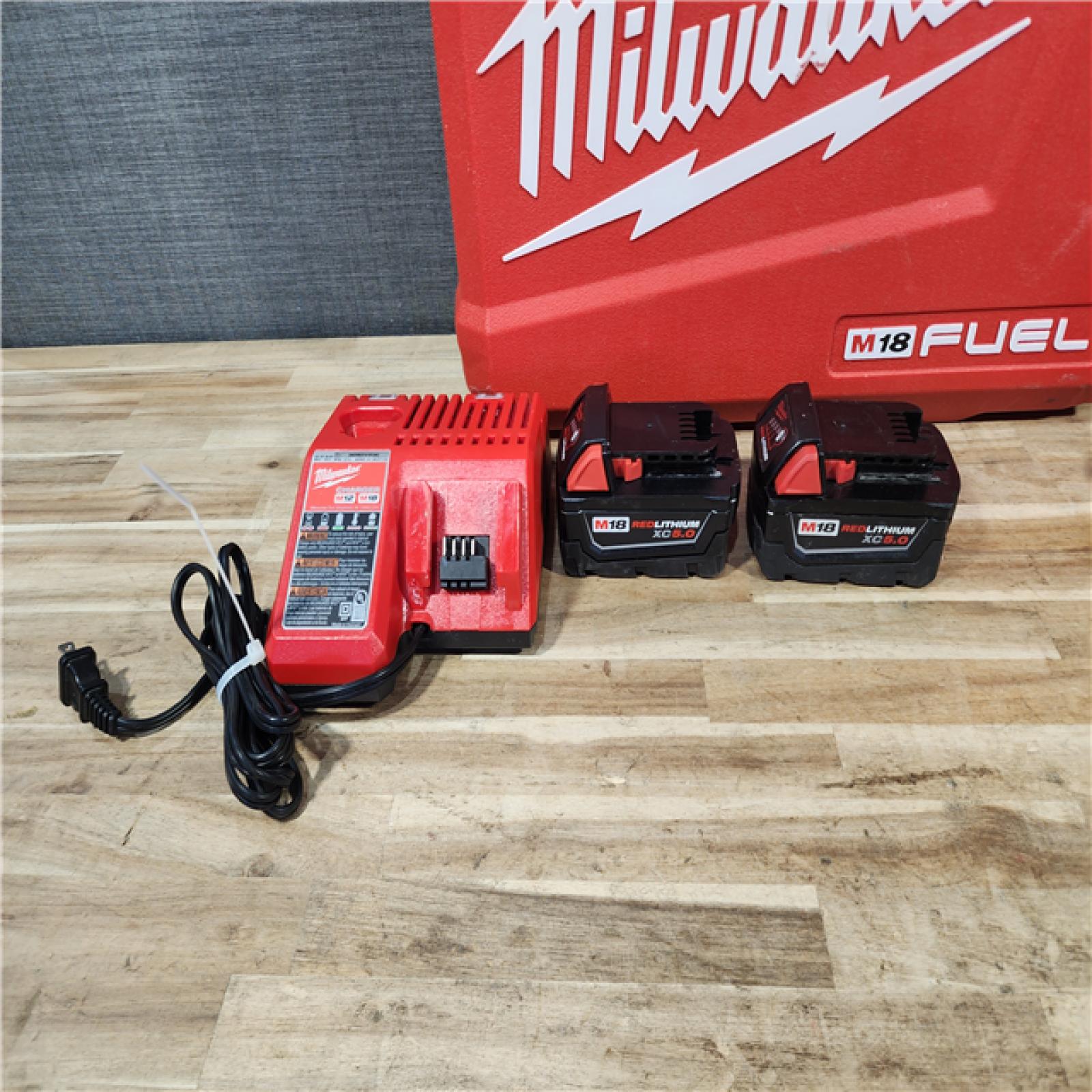 HOUSTON LOCATION - AS-IS Milwaukee FUEL 18V Lithium-Ion Brushless Cordless Hammer Drill and Impact Driver Combo Kit