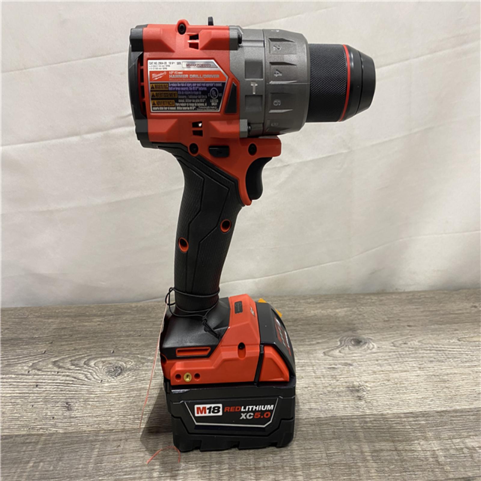 AS-IS Milwaukee FUEL 18V Lithium-Ion Brushless Cordless 1/2 in. Hammer Drill Driver Kit