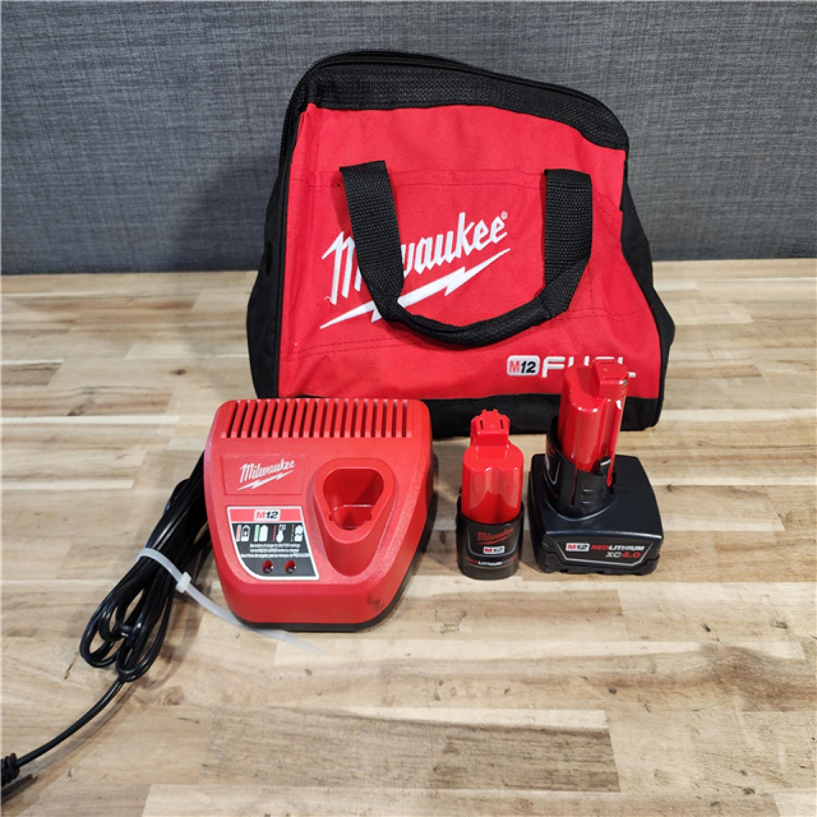HOUSTON LOCATION - AS-IS Milwaukee FUEL 12-Volt Lithium-Ion Brushless Cordless Hammer Drill and Impact Driver Combo Kit