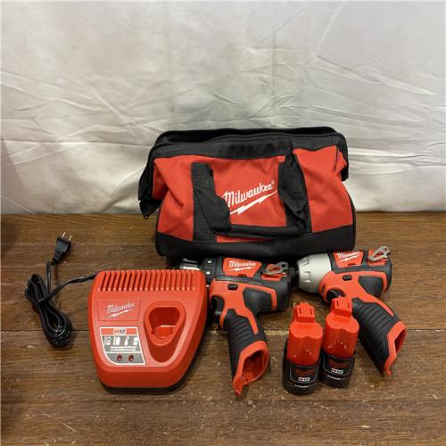 AS-IS Milwaukee 2494-22 M12 Cordless Combination 3/8  Drill / Driver and 1/4  Hex Impact Driver Dual Power Tool Kit (2 Lithium Ion Batteries  Charger  and B