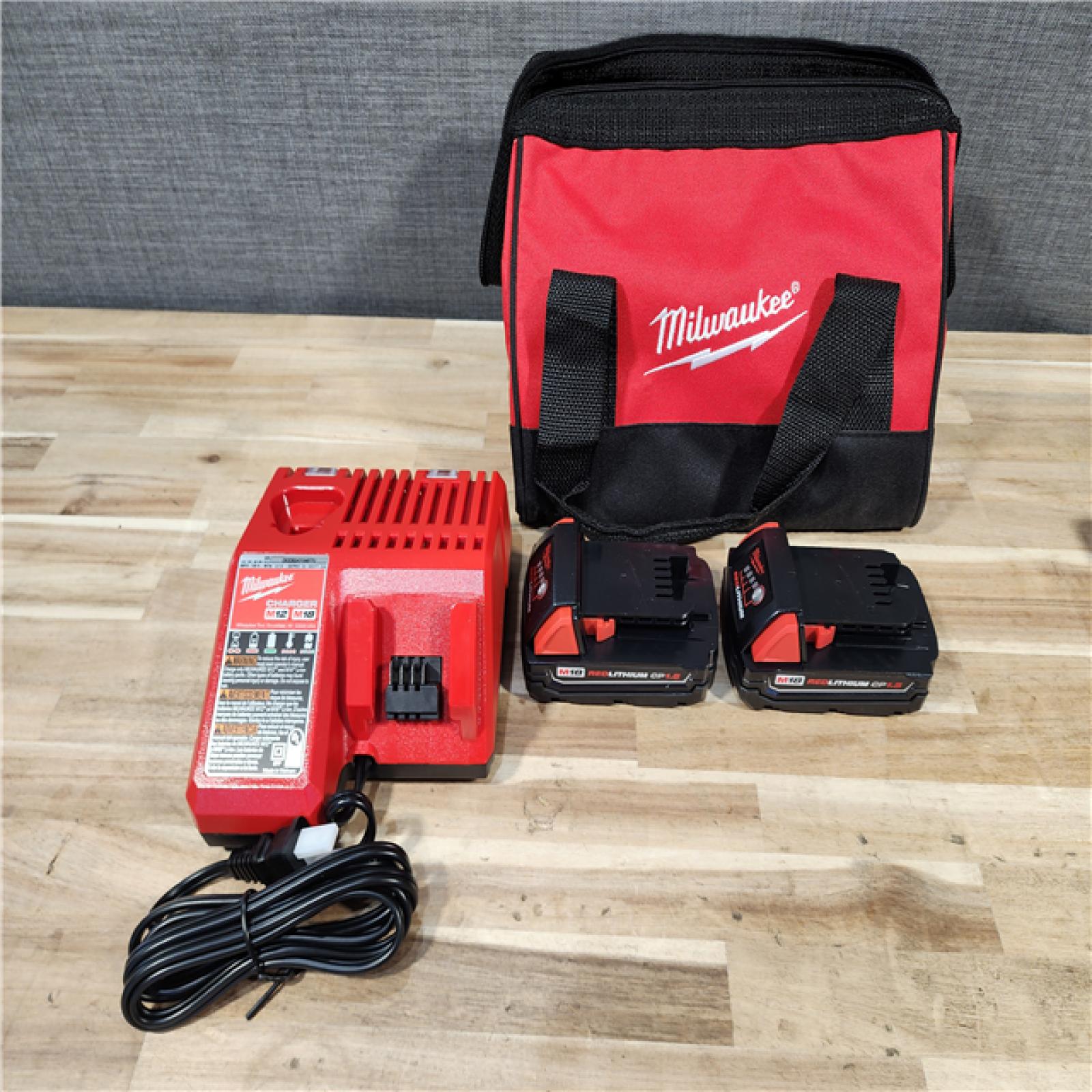 HOUSTON LOCATION - AS-IS Milwaukee 18V Lithium-Ion Cordless Drill Driver/Impact Driver Combo Kit