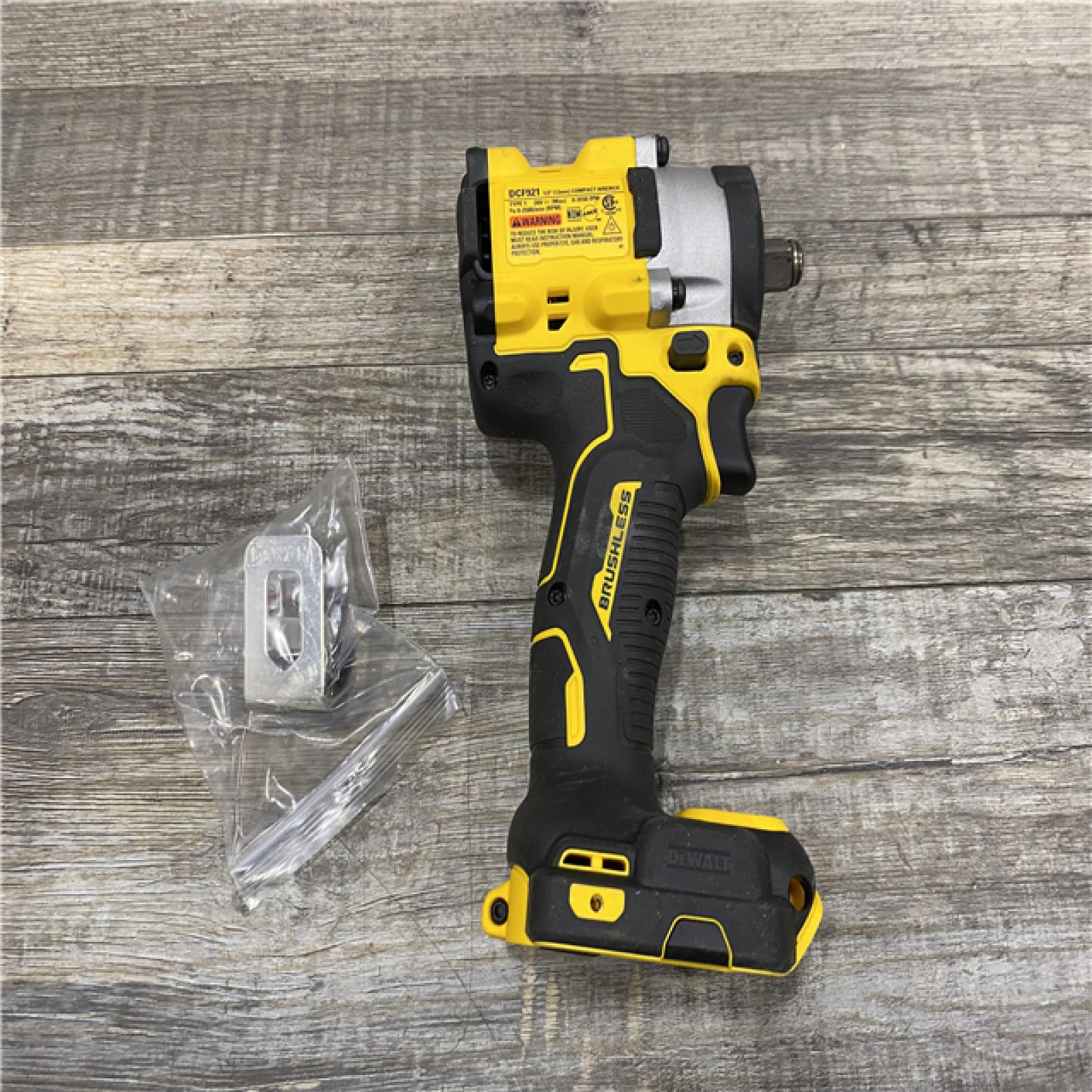 AS-IS DEWALT ATOMIC 20V MAX Cordless Brushless 1/2 in. Variable Speed Impact Wrench (Tool Only)