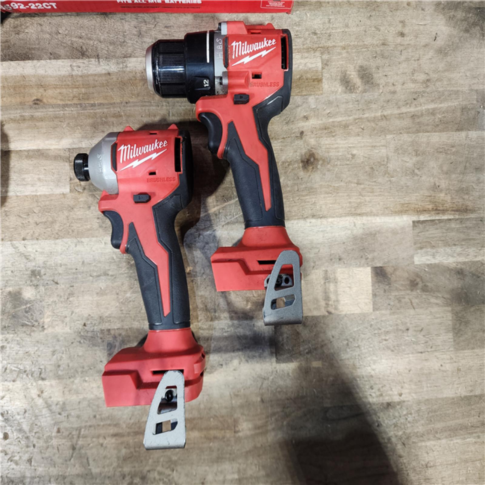 HOUSTON LOCATION - AS-IS Milwaukee M18 18V Lithium-Ion Brushless Cordless Compact Drill/Impact Combo Kit (2-Tool) W/(2) 2.0 Ah Batteries  Charger & Bag