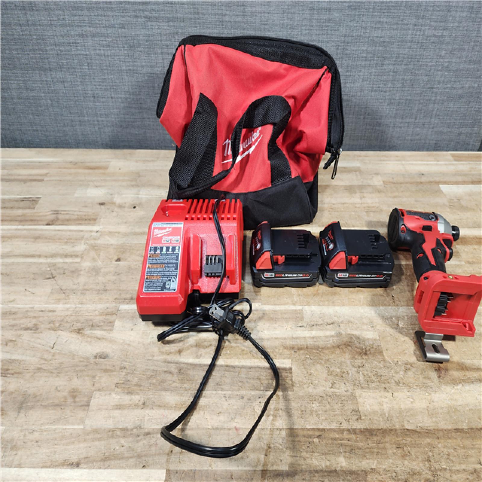 HOUSTON LOCATION - AS - IS Milwaukee 18-Volt Lithium-Ion Compact Brushless Cordless 1/4 in. Impact Driver Kit