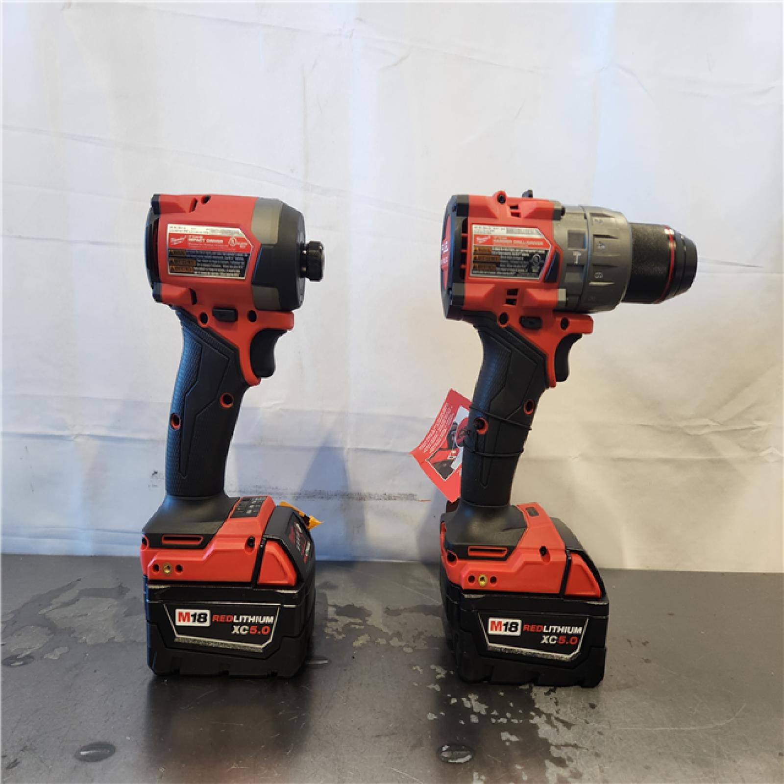 AS-IS- Milwaukee FUEL 18V Lithium-Ion Brushless Cordless Hammer Drill and Impact Driver Combo Kit