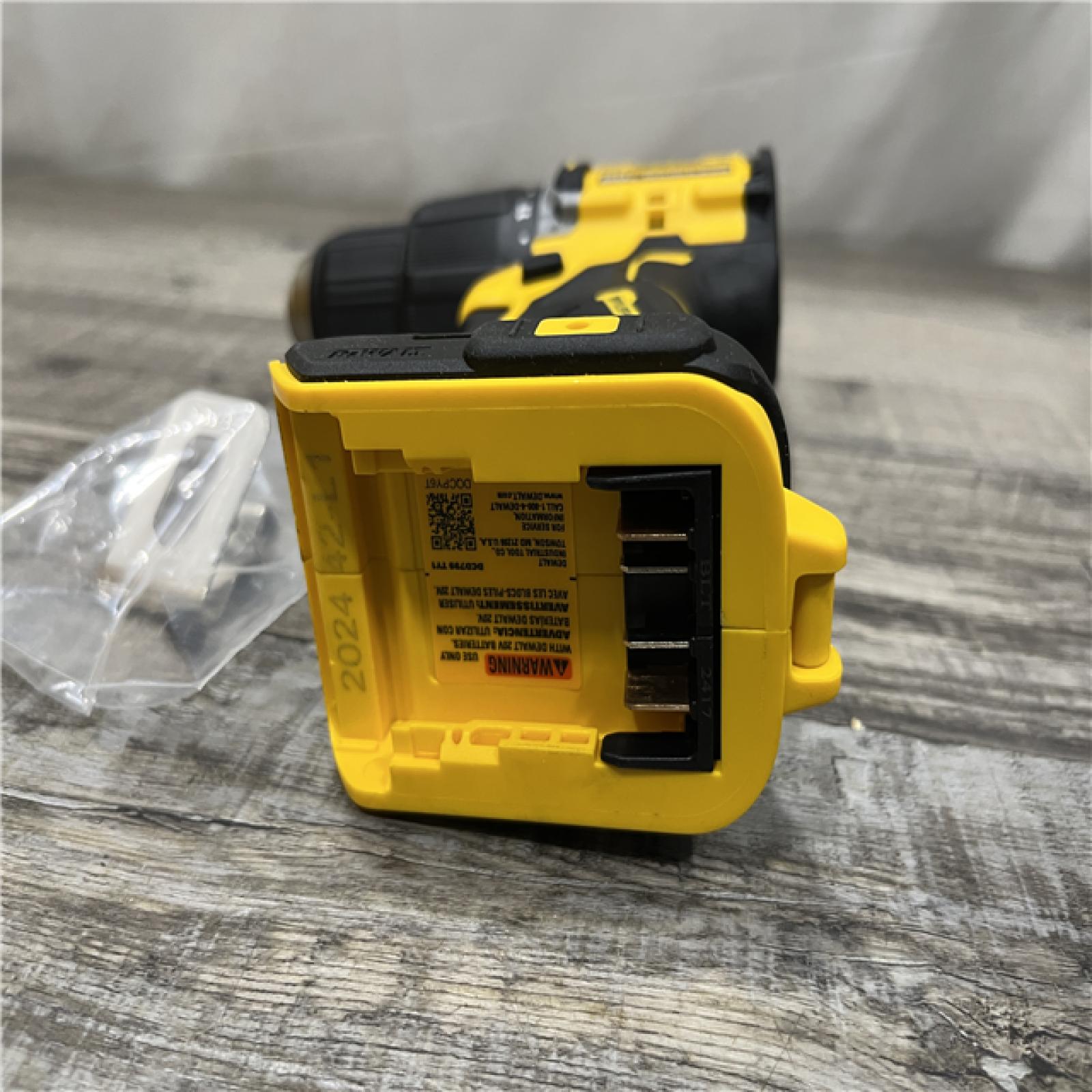 AS-IS DEWALT ATOMIC 20-Volt MAX Brushless Cordless 1/2 in. Hammer Drill (Tool-Only)