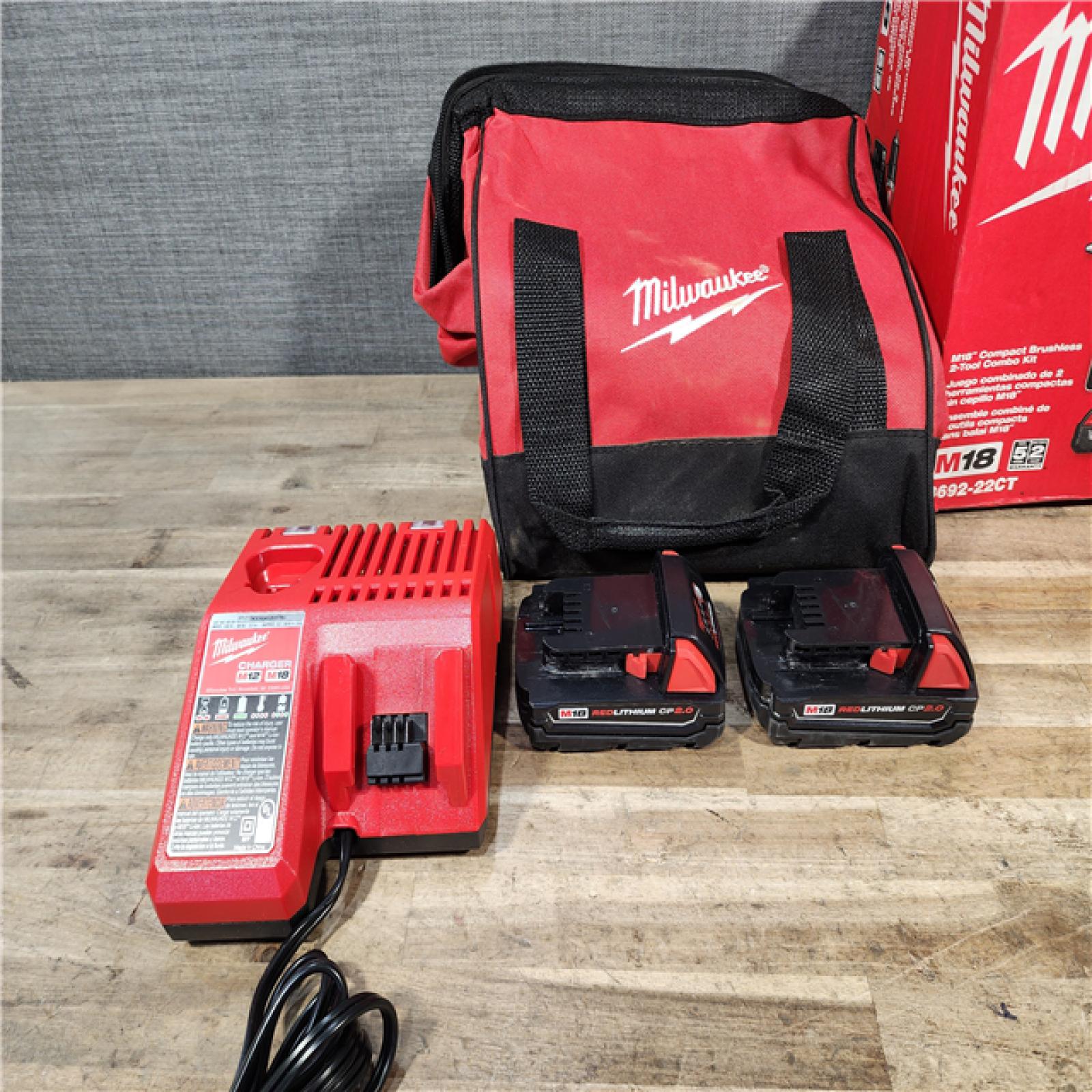 HOUSTON LOCATION - AS-IS Milwaukee 18V Lithium-Ion Brushless Cordless Compact Drill/Impact Combo Kit