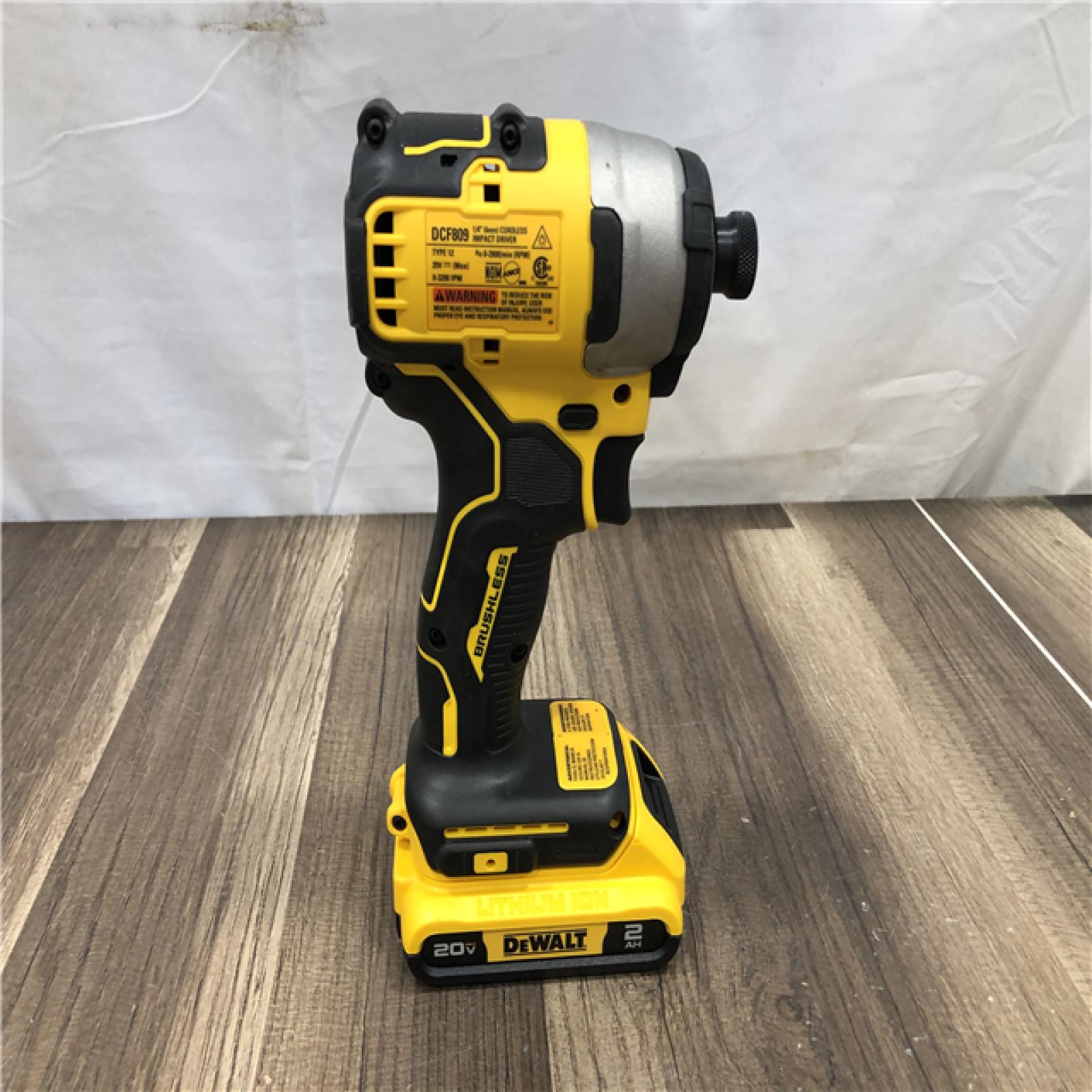 AS-IS DEWALT Atomic 20V Max Lithium-Ion Brushless Cordless Compact 1/4 in. Impact Driver Kit