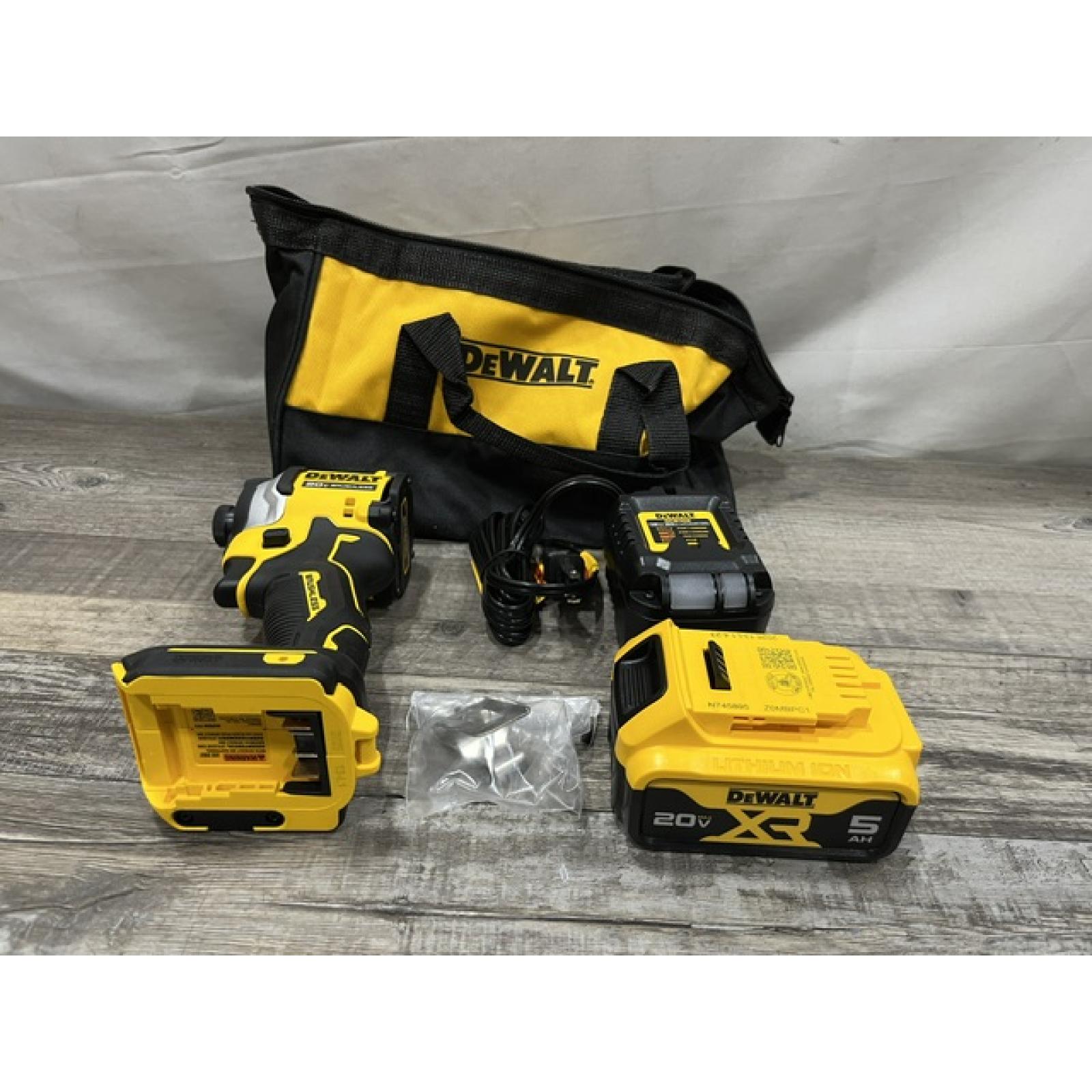 AS-IS DEWALT ATOMIC 20V MAX Lithium-Ion Cordless 1/4 in. Brushless Impact Driver Kit