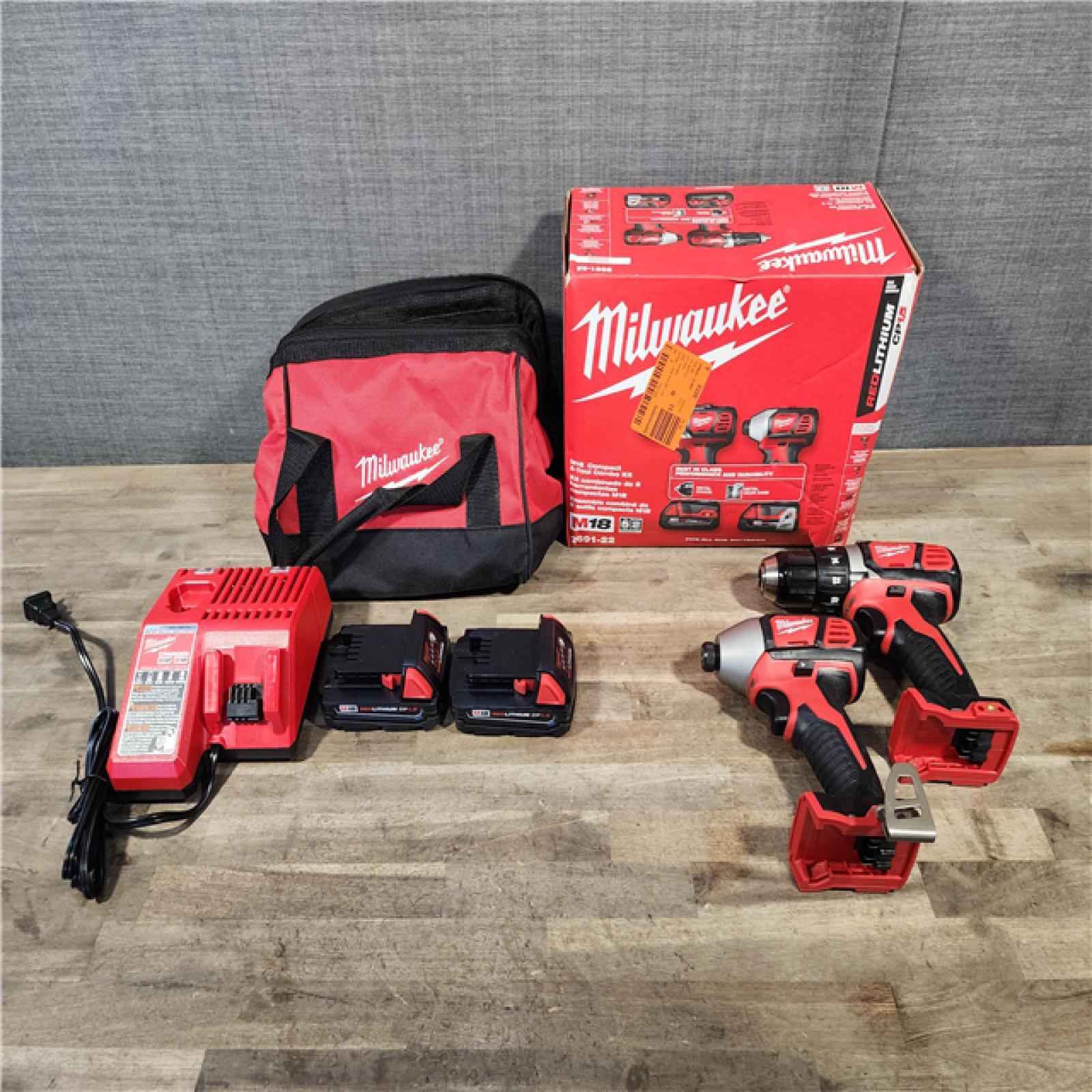 HOUSTON LOCATION - AS-IS Milwaukee 18V Cordless Brushed 2-Tool Drill/Driver and Impact Driver Kit