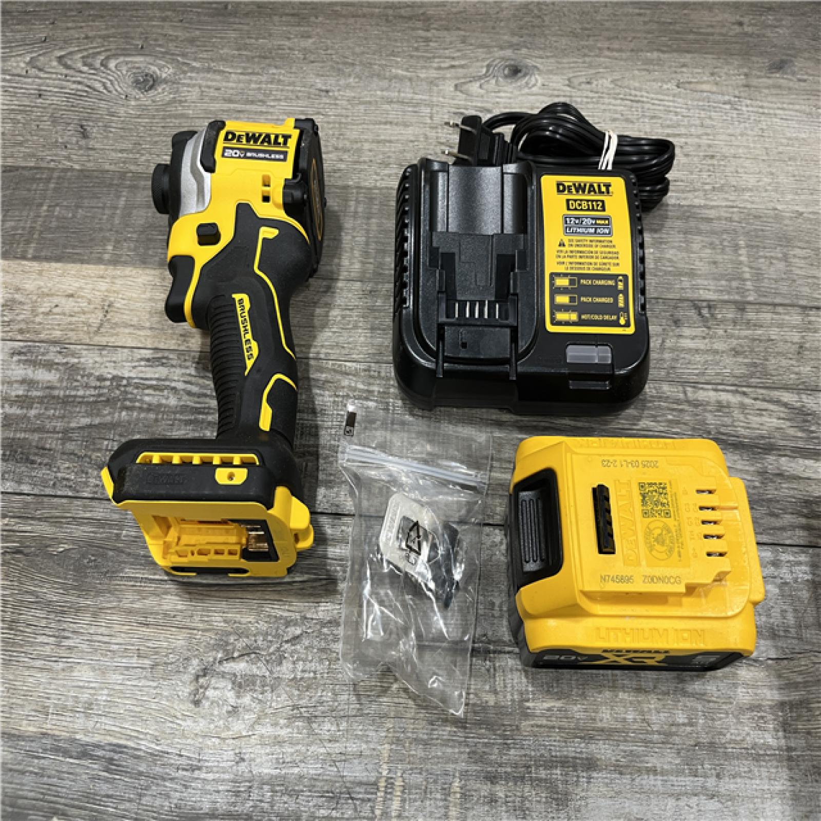 AS-IS DEWALT ATOMIC 20V MAX Lithium-Ion Cordless 1/4 in. Brushless Impact Driver Kit