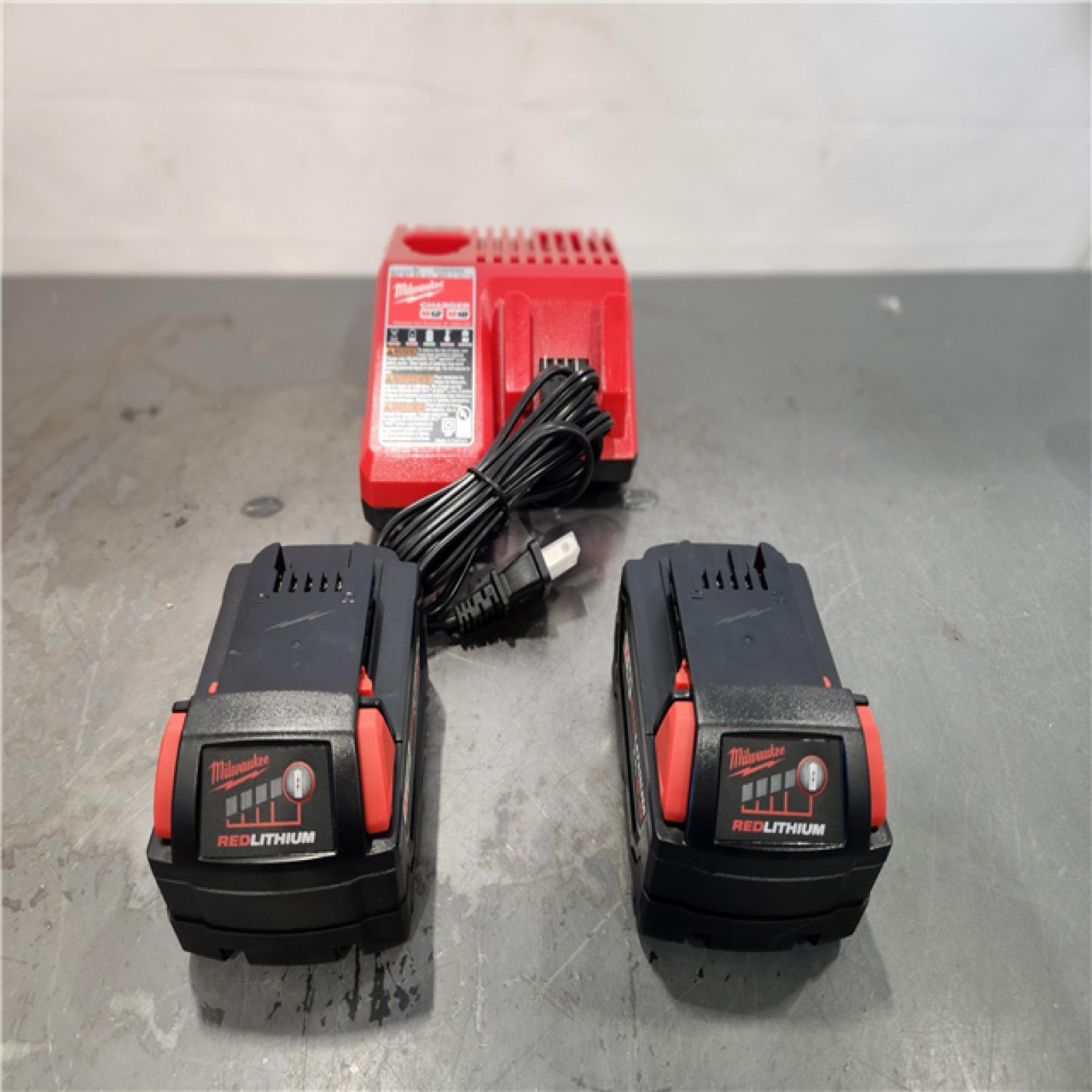 AS-IS- Milwaukee M18 18-Volt Lithium-Ion XC Starter Kit with Two 5.0Ah Batteries and Charger