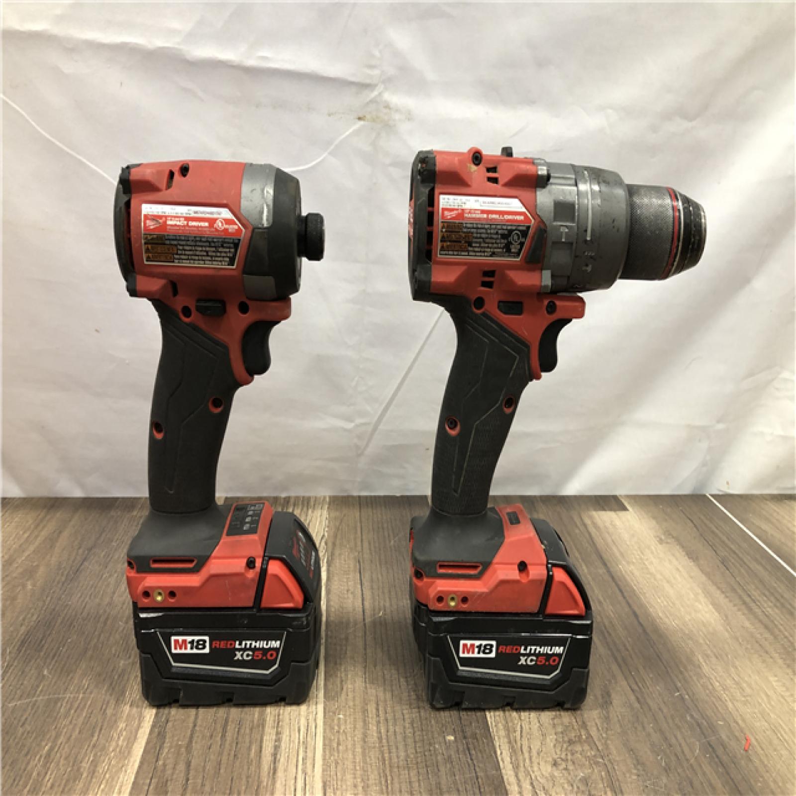 AS-IS Milwaukee FUEL 18V Lithium-Ion Brushless Cordless Hammer Drill and Impact Driver Combo Kit
