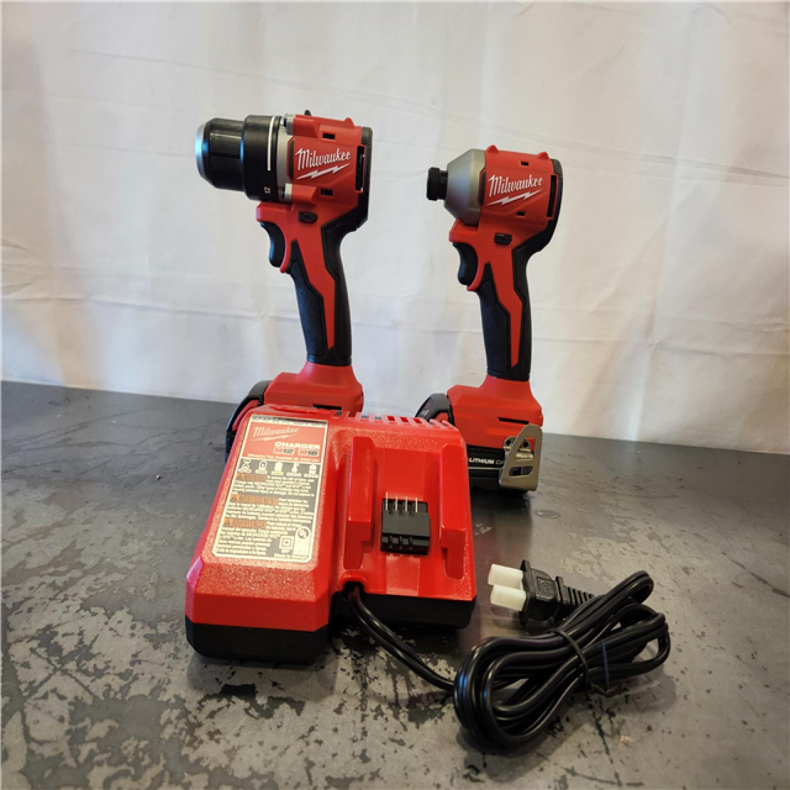 AS-IS- Milwaukee 18V Lithium-Ion Brushless Cordless Compact Drill/Impact Combo Kit