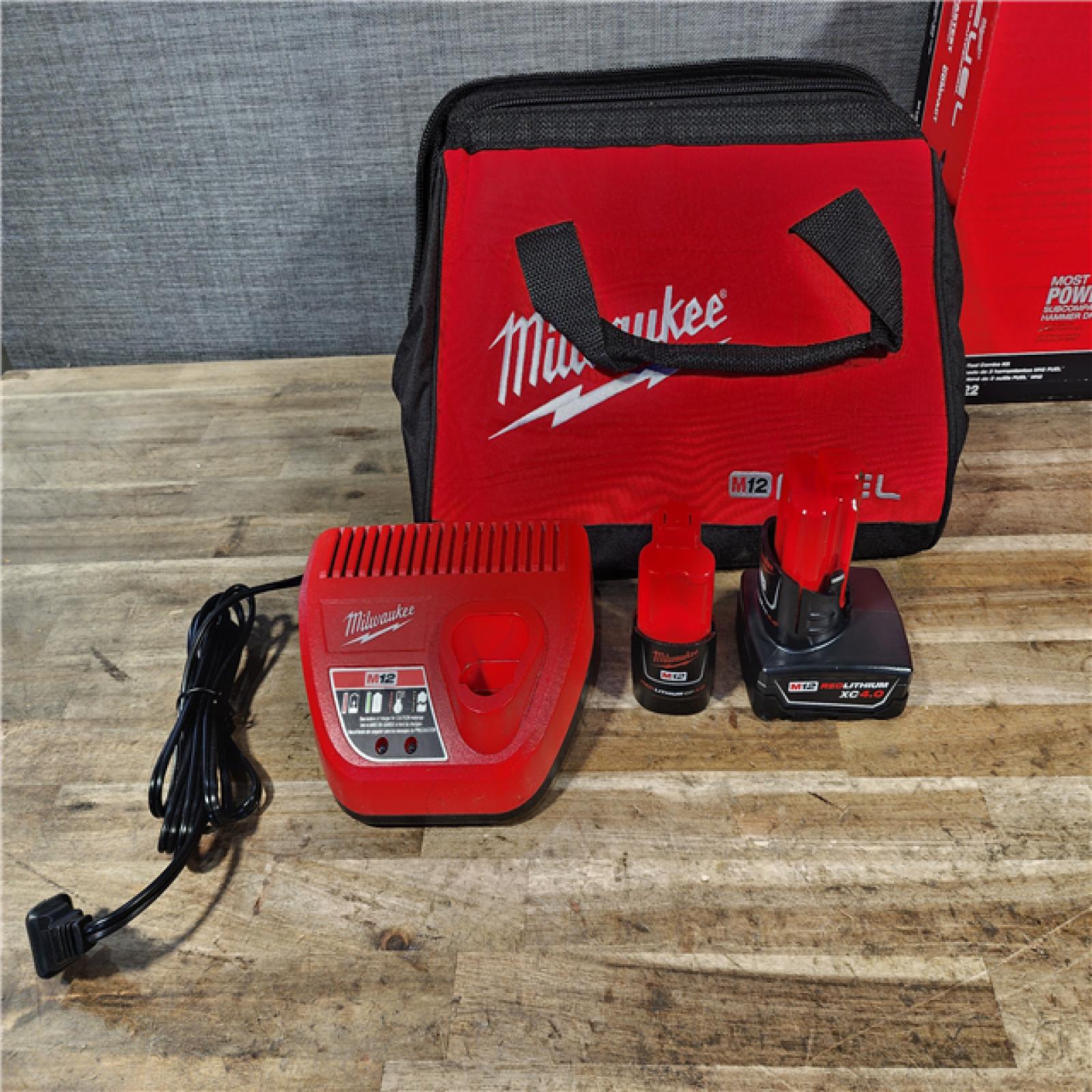 HOUSTON LOCATION - AS-IS Milwaukee FUEL 12-Volt Lithium-Ion Brushless Cordless Hammer Drill and Impact Driver Combo Kit