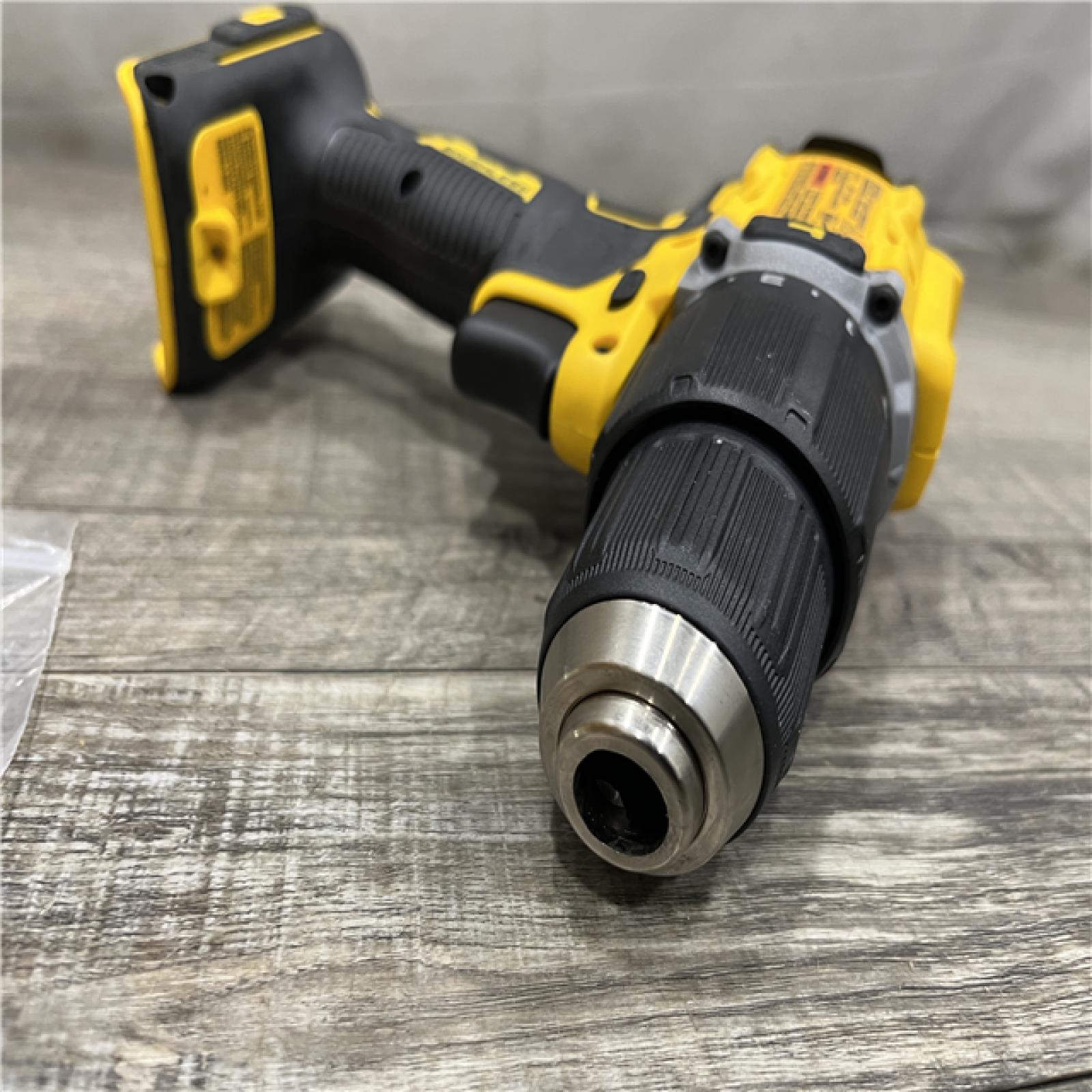 AS-IS DEWALT ATOMIC 20-Volt MAX Brushless Cordless 1/2 in. Hammer Drill (Tool-Only)