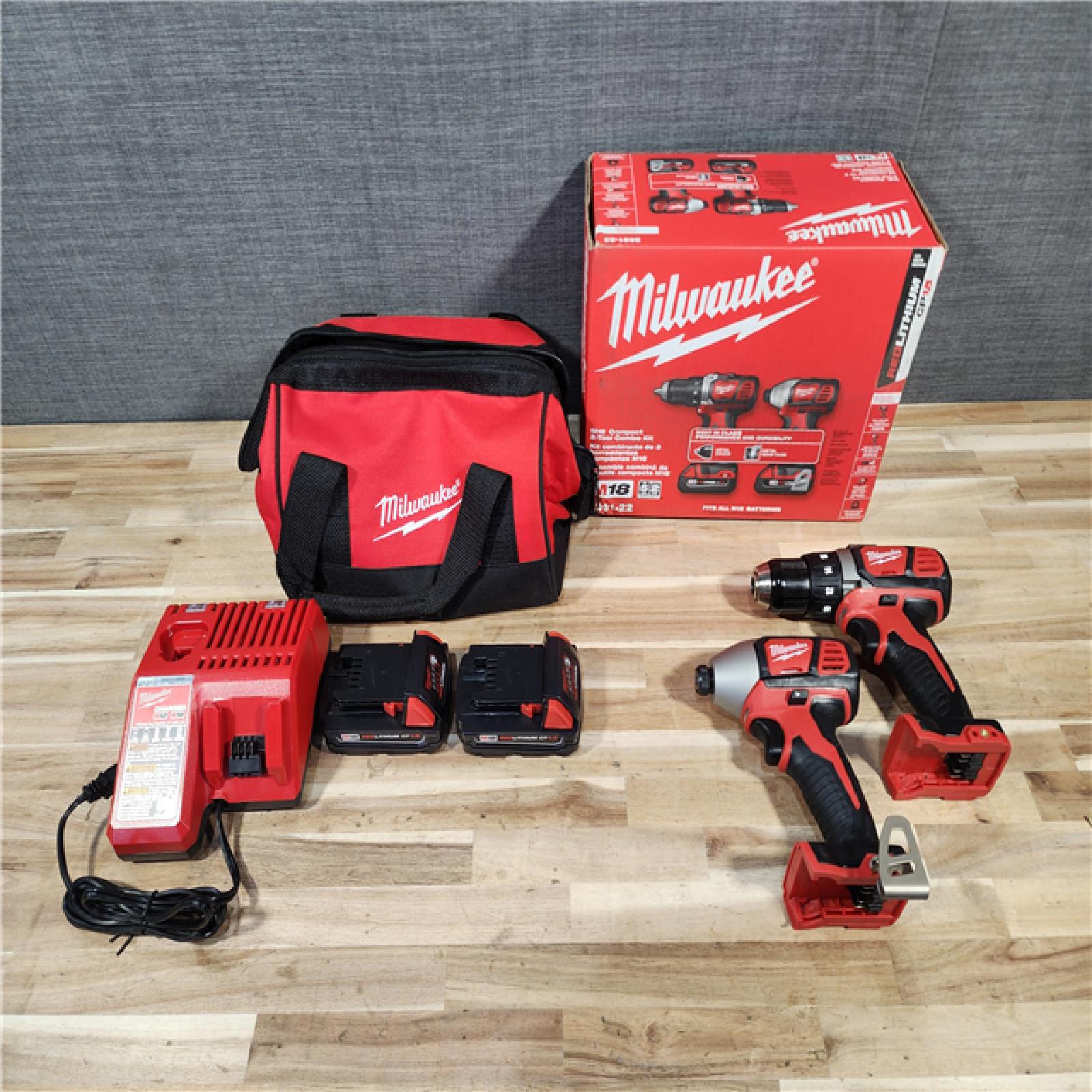 HOUSTON LOCATION - AS-IS Milwaukee  18V Lithium-Ion Cordless Drill Driver/Impact Driver Combo Kit