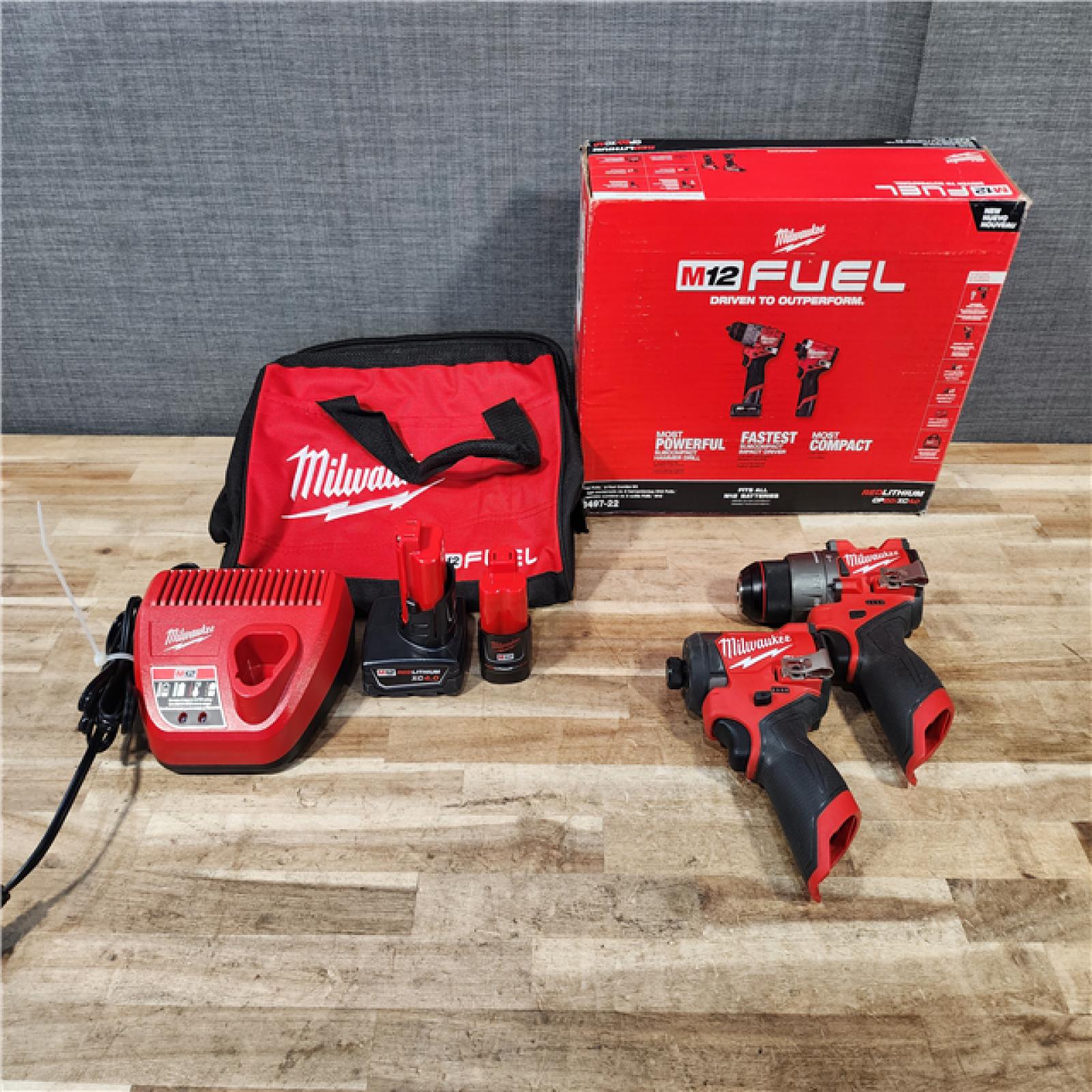 HOUSTON LOCATION - AS-IS Milwaukee FUEL 12-Volt Lithium-Ion Brushless Cordless Hammer Drill and Impact Driver Combo Kit