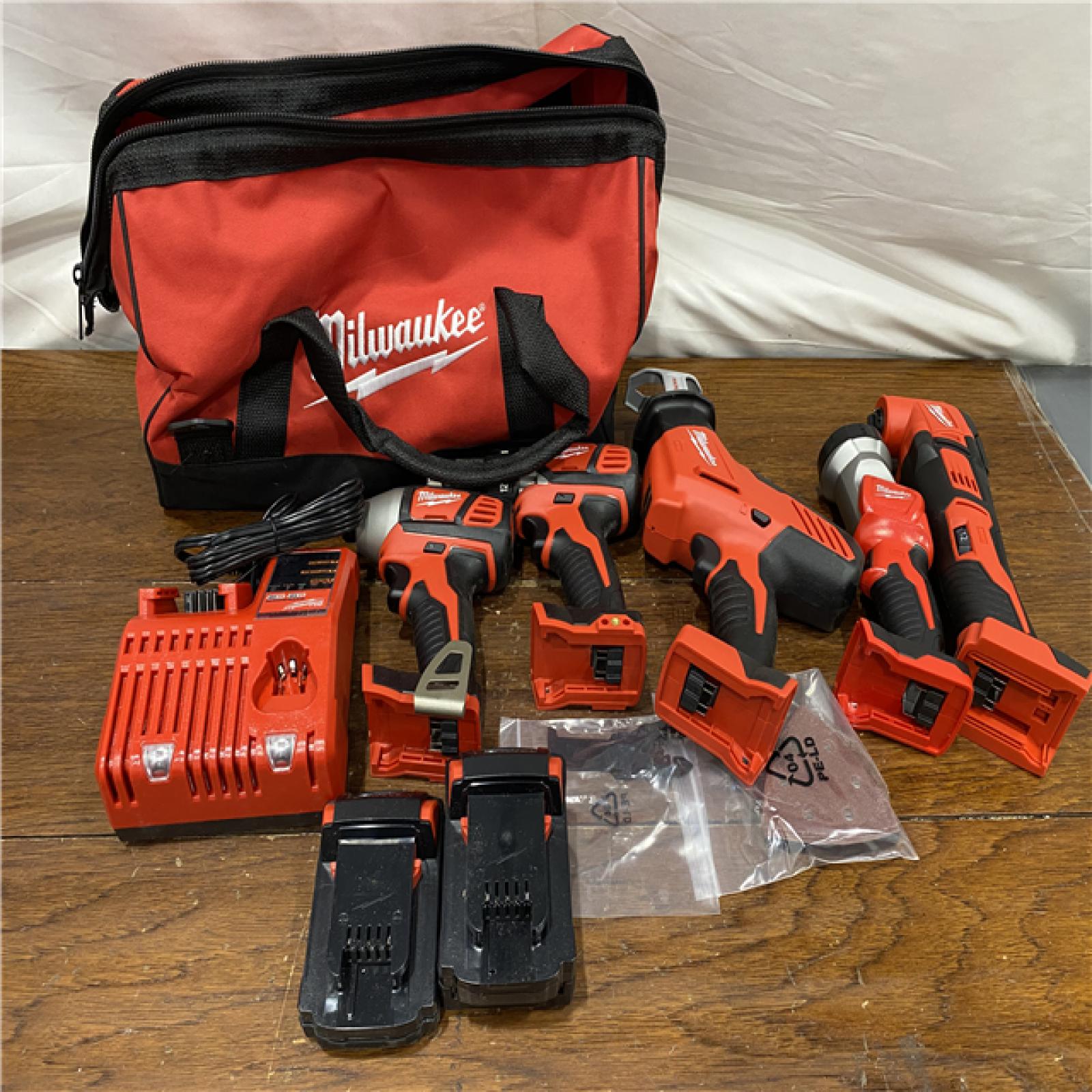 AS-IS M18 18V Lithium-Ion Cordless Combo Kit (5-Tool) with (2) Batteries, Charger and Tool Bag