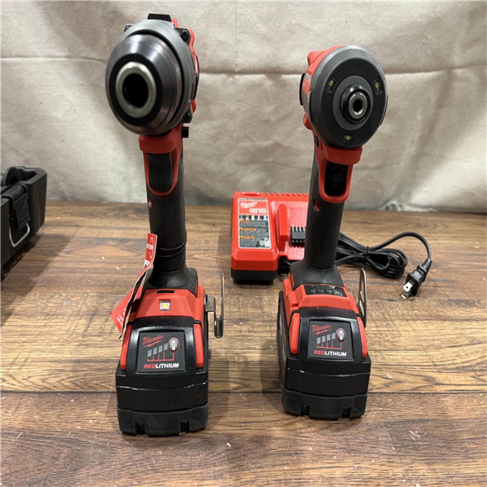 AS-IS Milwaukee M18 FUEL 18V Lithium-Ion Brushless Cordless Hammer Drill and Impact Driver Combo Kit (2-Tool) with 2 Batteries