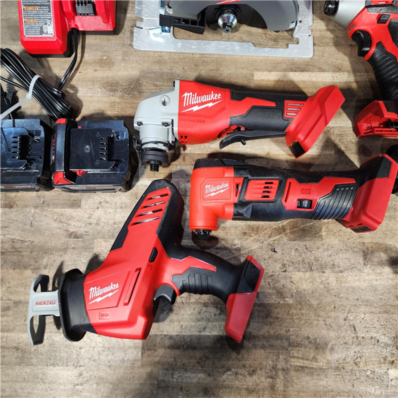 HOUSTON LOCATION - AS-IS Milwaukee M18 18-Volt Lithium-Ion Cordless Combo Kit (9-Tool) with (2) Batteries  Charger  and Tool Bag
