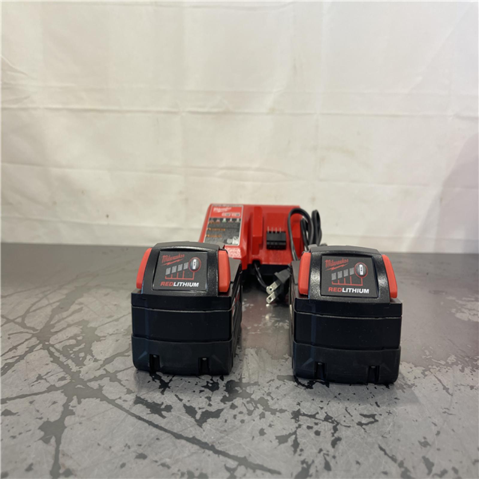 AS-IS- Milwaukee M18 18-Volt Lithium-Ion XC Starter Kit with Two 5.0Ah Batteries and Charger