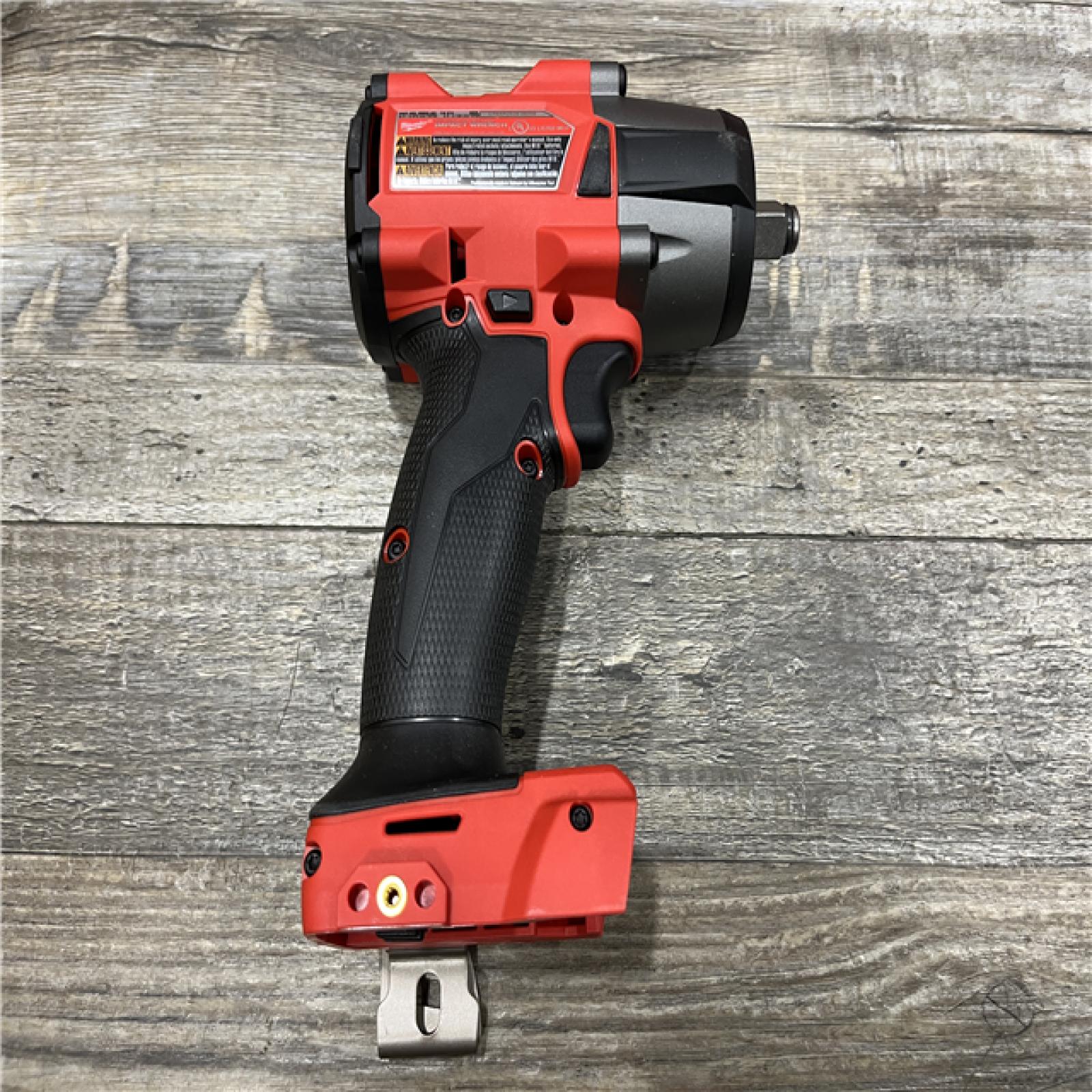 AS-IS Milwaukee FUEL 18V Lithium-Ion Brushless Cordless 1/2 in. Mid-Torque Impact Wrench with Friction Ring Kit