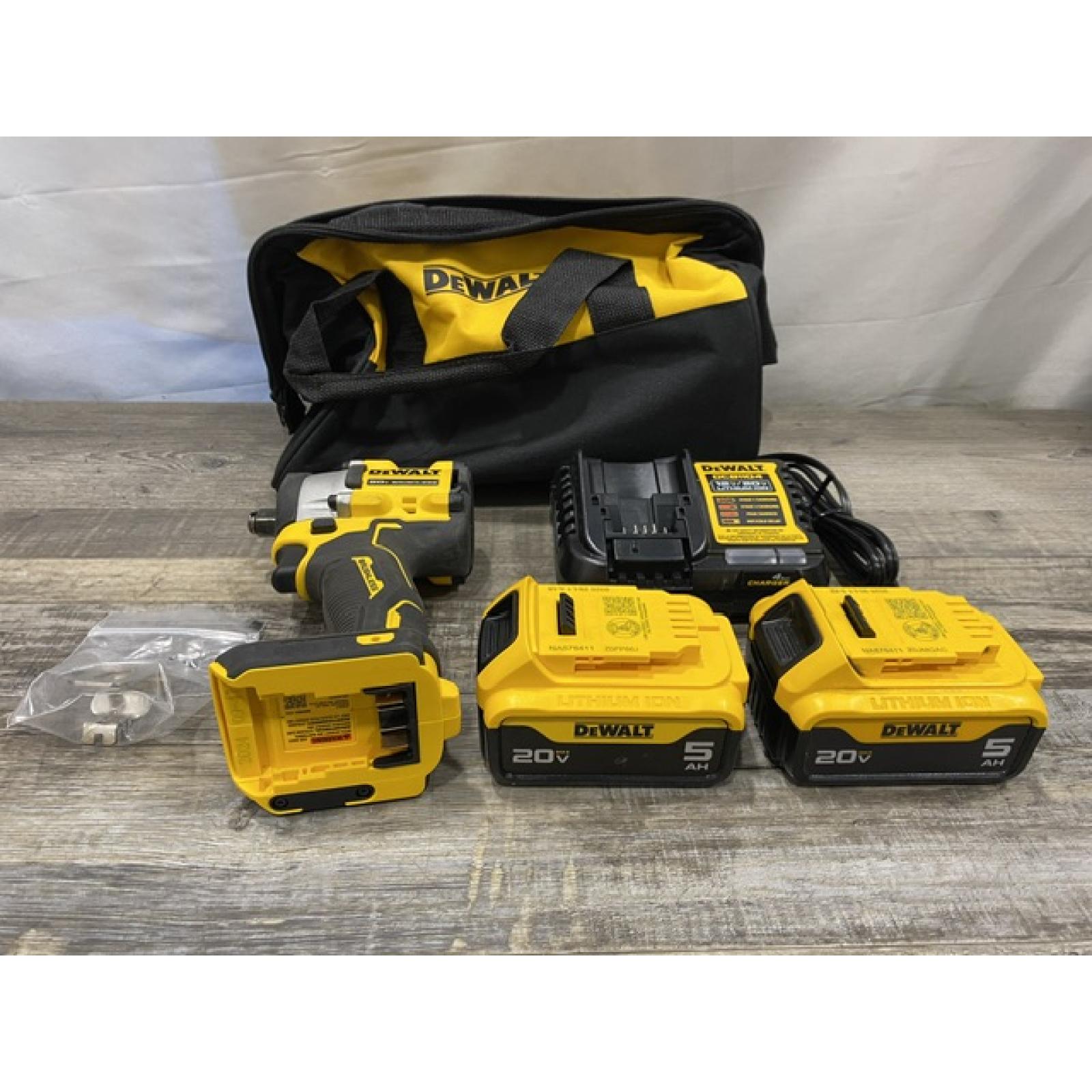 AS-IS DEWALT ATOMIC 20V MAX Lithium-Ion Cordless Brushless 1/2 in. Impact Wrench Kit