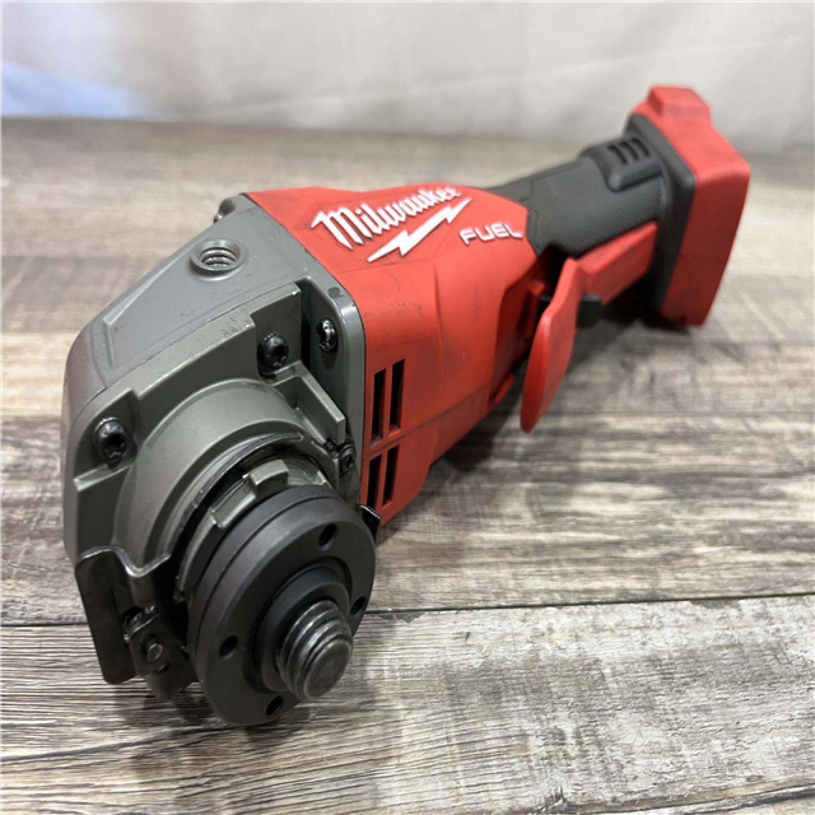 AS-IS Milwaukee FUEL 18V Lithium-Ion Brushless Cordless 4-1/2 in./5 in. Grinder w/Paddle Switch (Tool-Only)