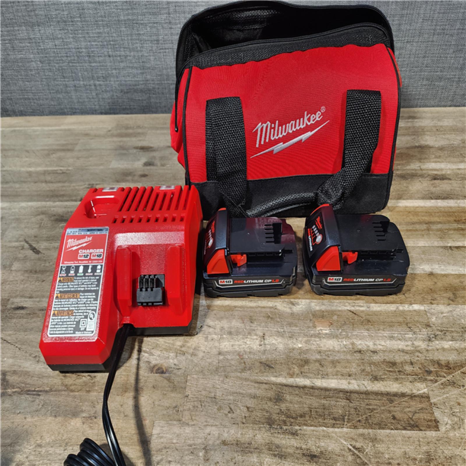 HOUSTON LOCATION - AS-IS Milwaukee M18 Brushed Cordless (2-Tool) Drill/Driver and Impact Driver Kit