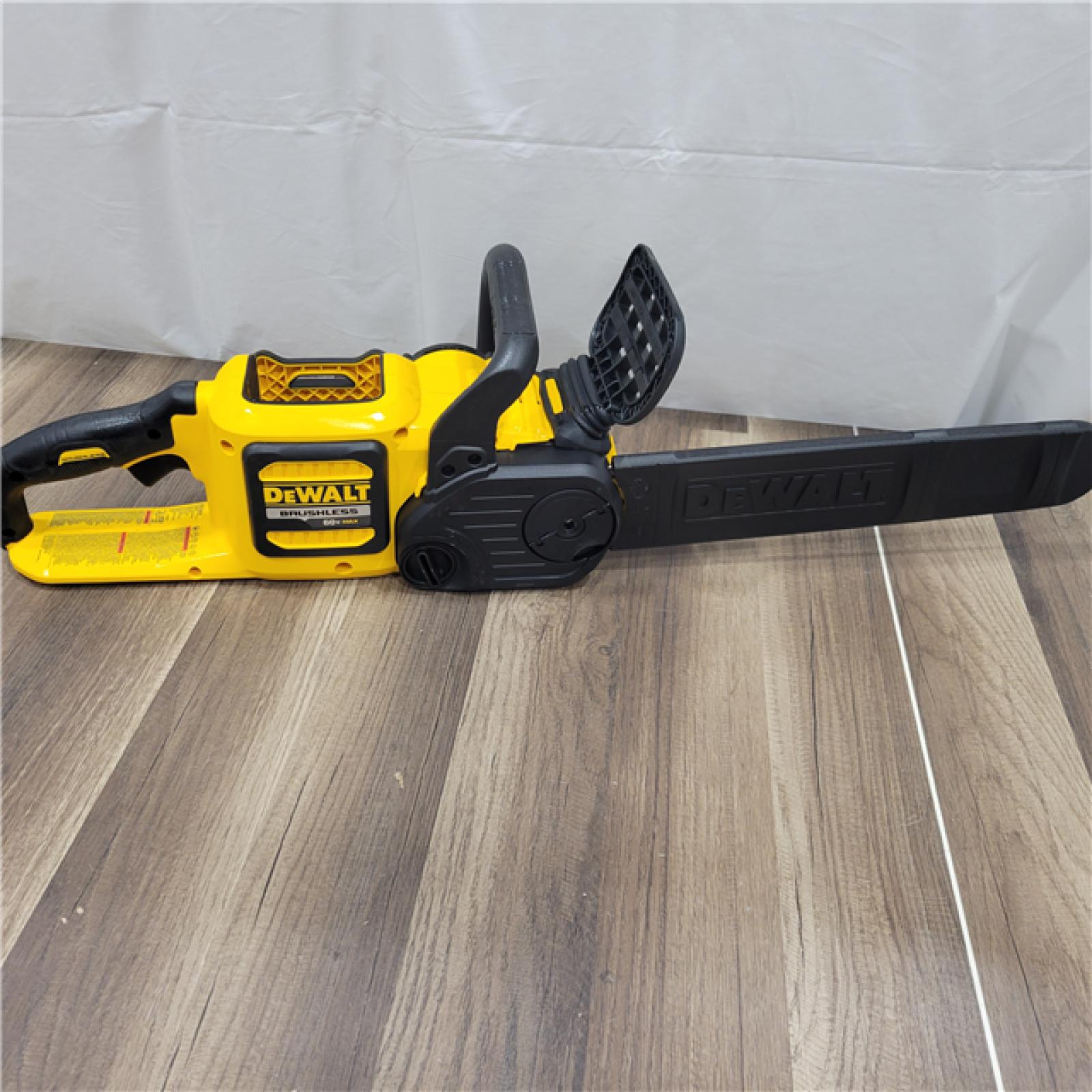 AS-IS  DEWALT  FLEXVOLT 60V MAX 16in. Brushless Cordless Battery Powered Chainsaw Kit with (1) FLEXVOLT 2 Ah Battery & Charger