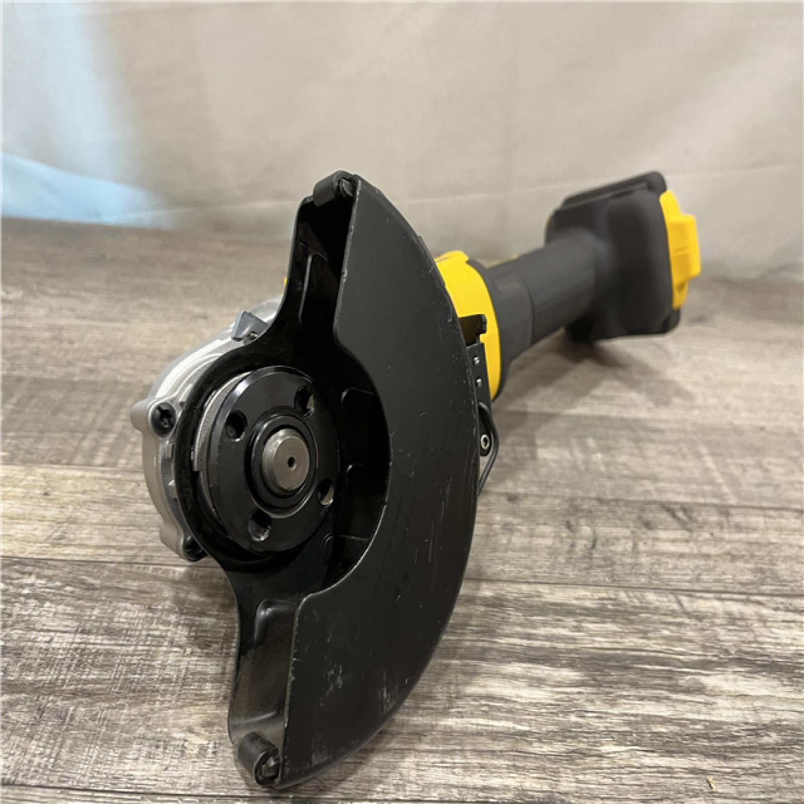 AS-IS DEWALT 20-Volt MAX Cordless Brushless 4-1/2 in. Angle Grinder with Slide Switch (Tool Only)