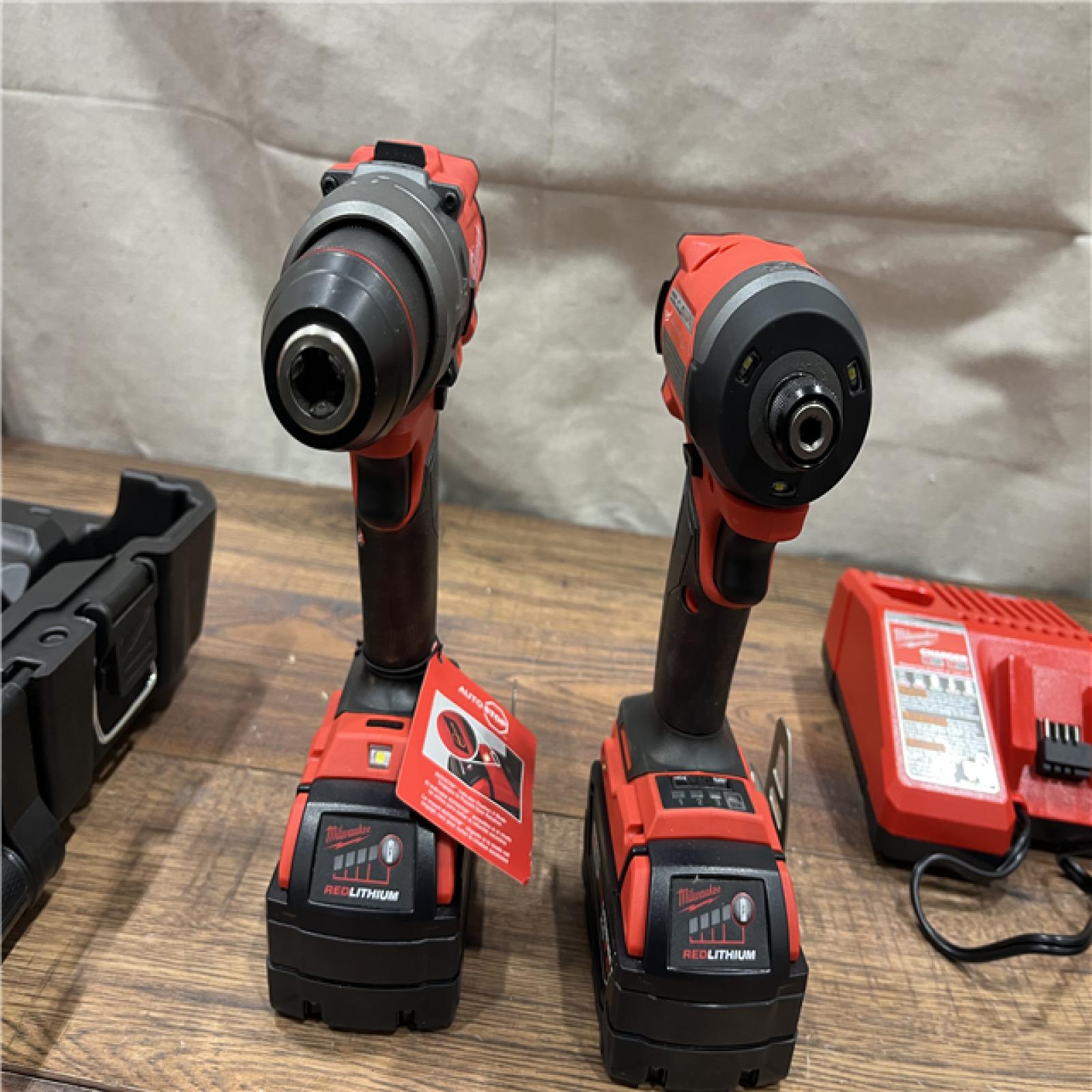 AS-IS Milwaukee M18 FUEL 18V Lithium-Ion Brushless Cordless Hammer Drill and Impact Driver Combo Kit (2-Tool) with 2 Batteries