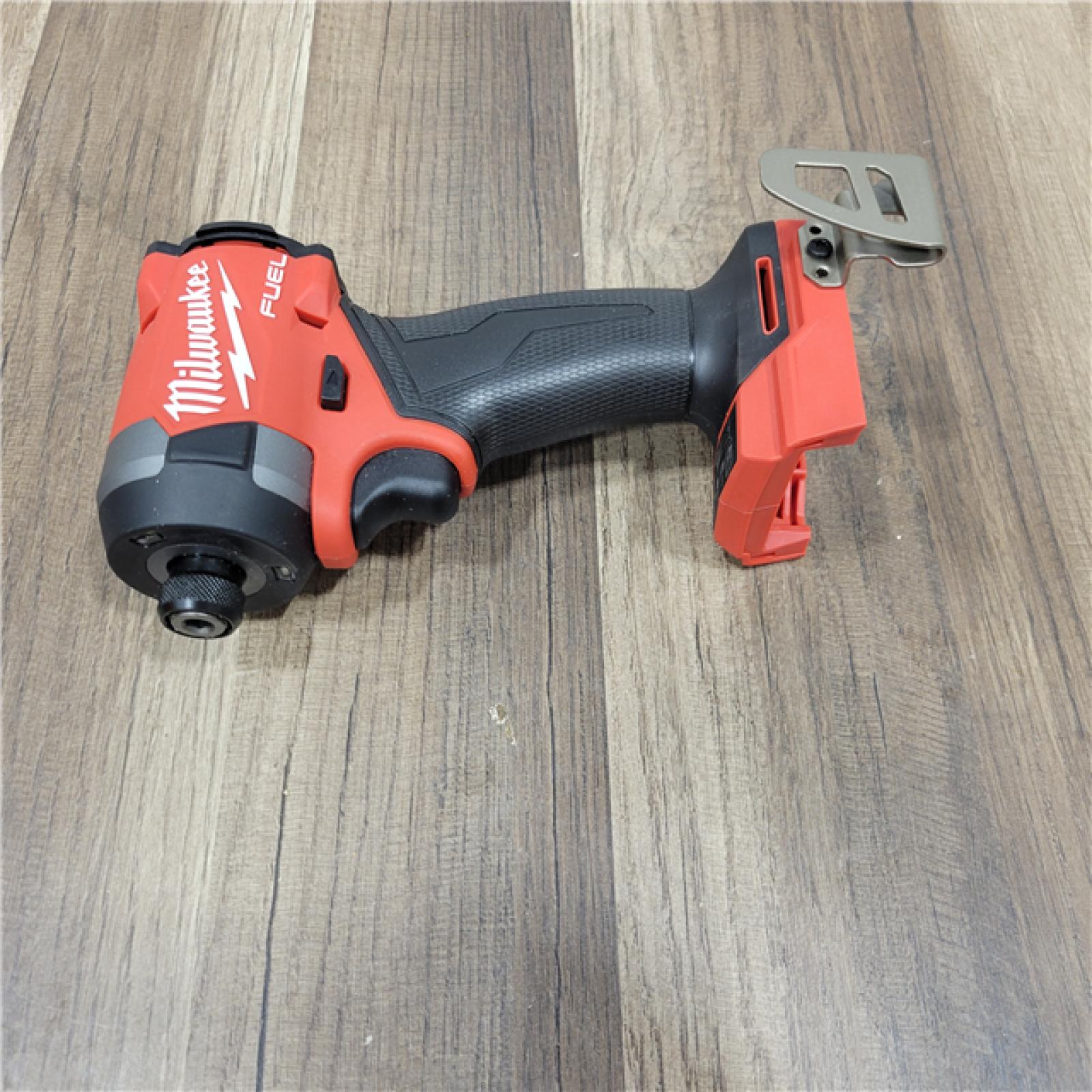 AS-IS Milwaukee 2953-20 18V Lithium-Ion Brushless Cordless 1/4   Hex Impact Driver Bare Tool  Red