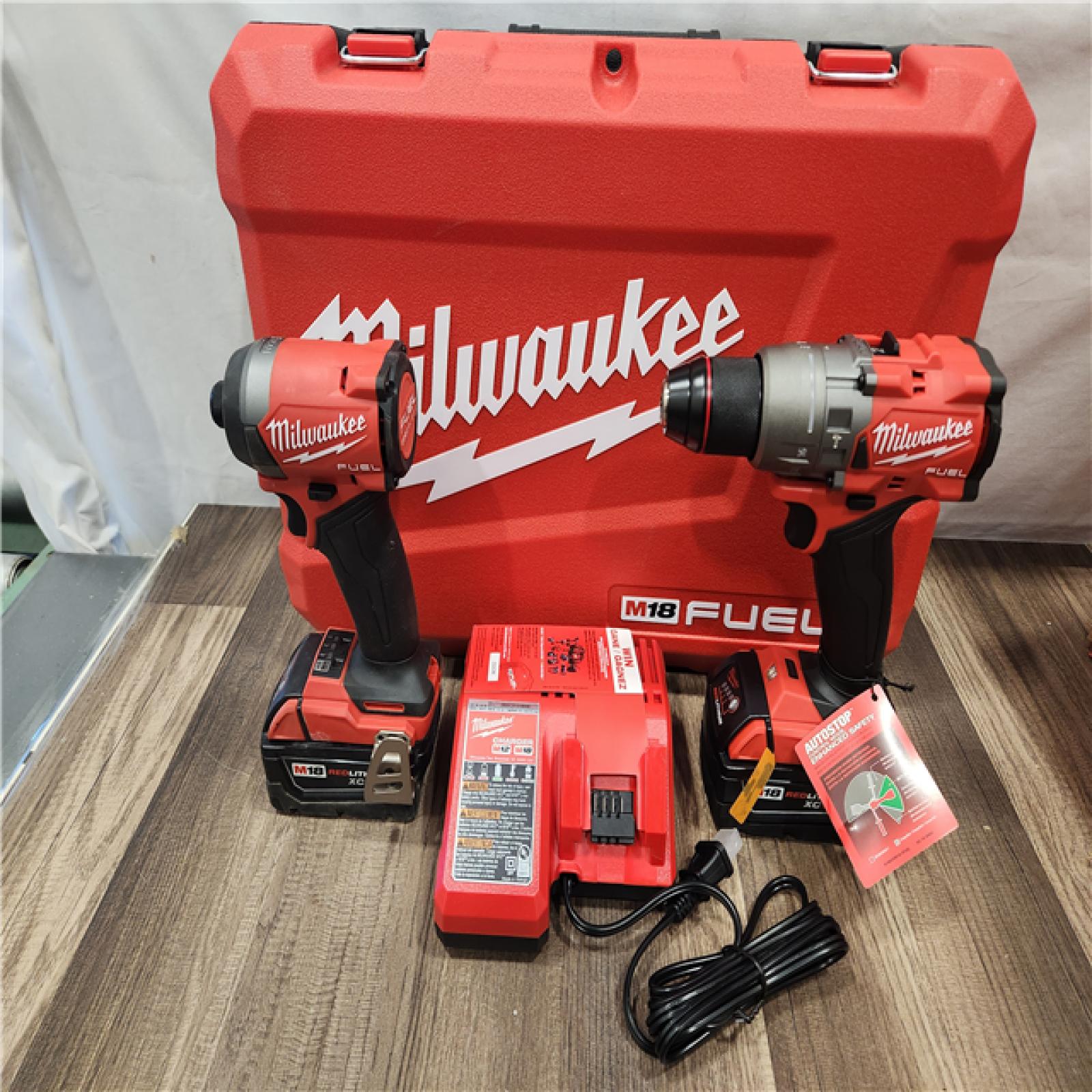 AS-IS- MILWAUKEE FUEL 18V Lithium-Ion Brushless Cordless Hammer Drill and Impact Driver Combo Kit