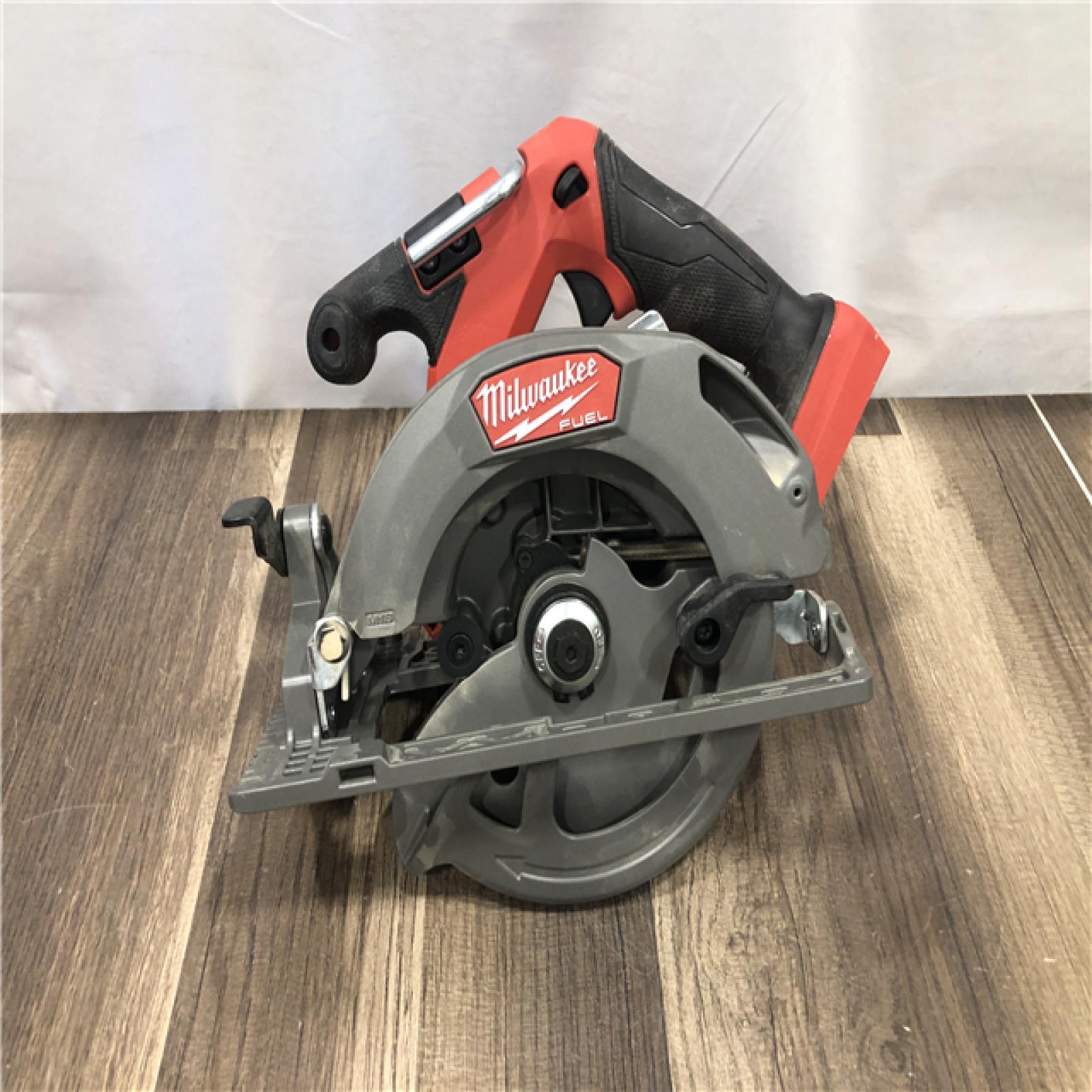 AS-IS Milwaukee FUEL 18V Lithium-Ion Brushless Cordless 6-1/2 in. Circular Saw (Tool-Only)