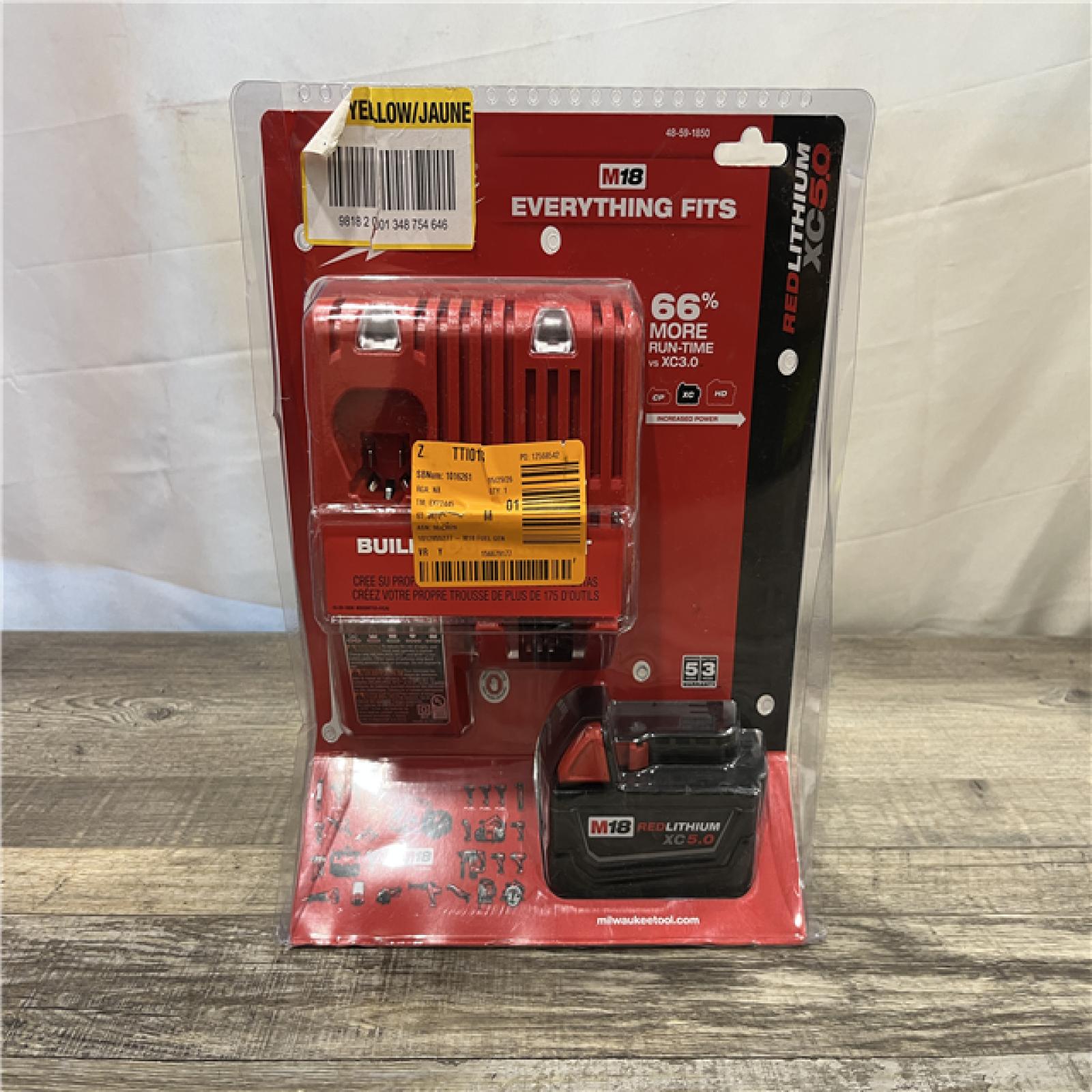 NEW - Milwaukee 18-Volt Lithium-Ion XC Starter Kit with (1) 5.0Ah Battery and Charger